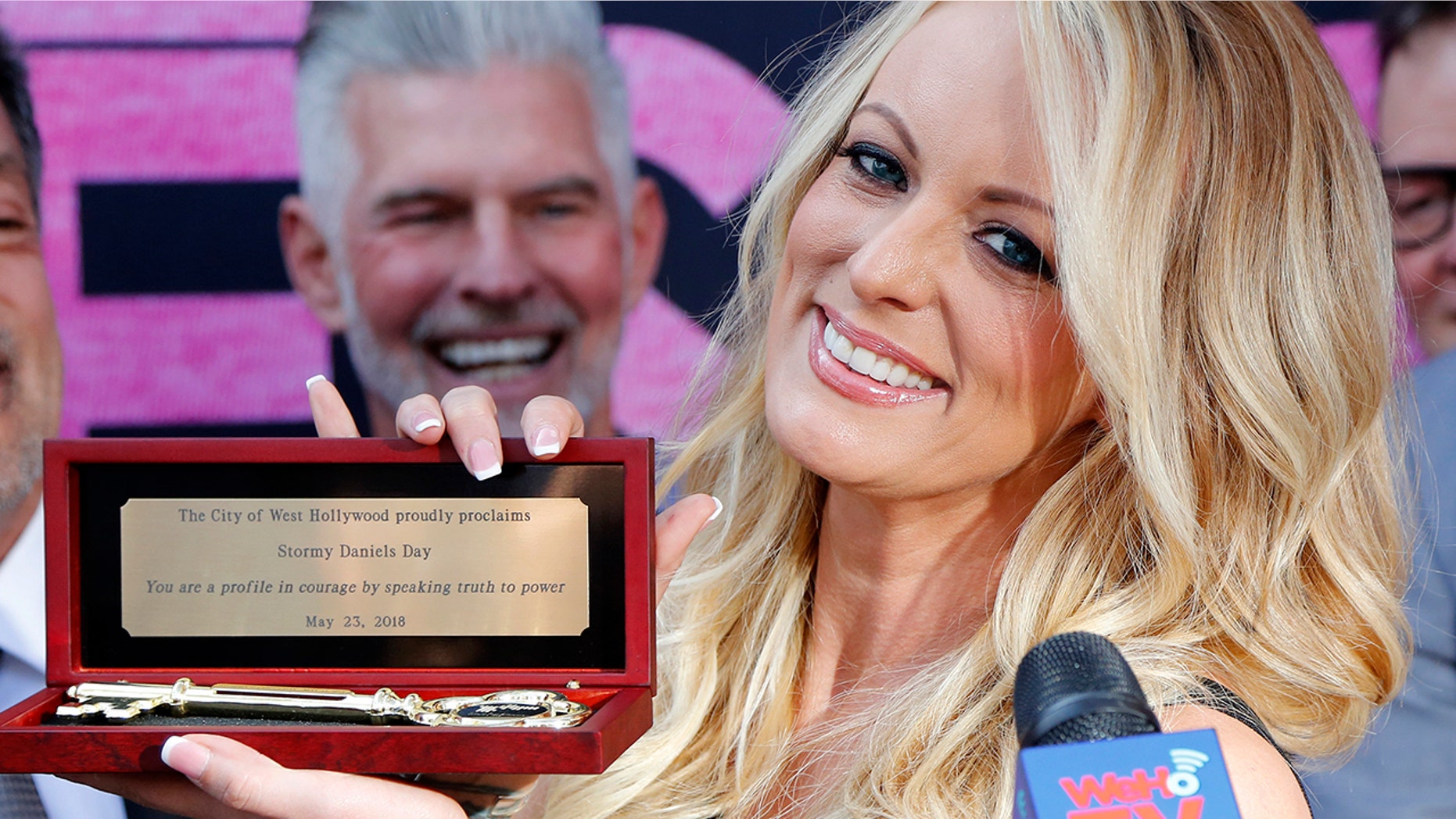 Stormy Daniels shows the Key during a ceremony for her receiving a City Proclamation and Key to the City on Wednesday, May 23, 2018 in West Hollywood, Calif.