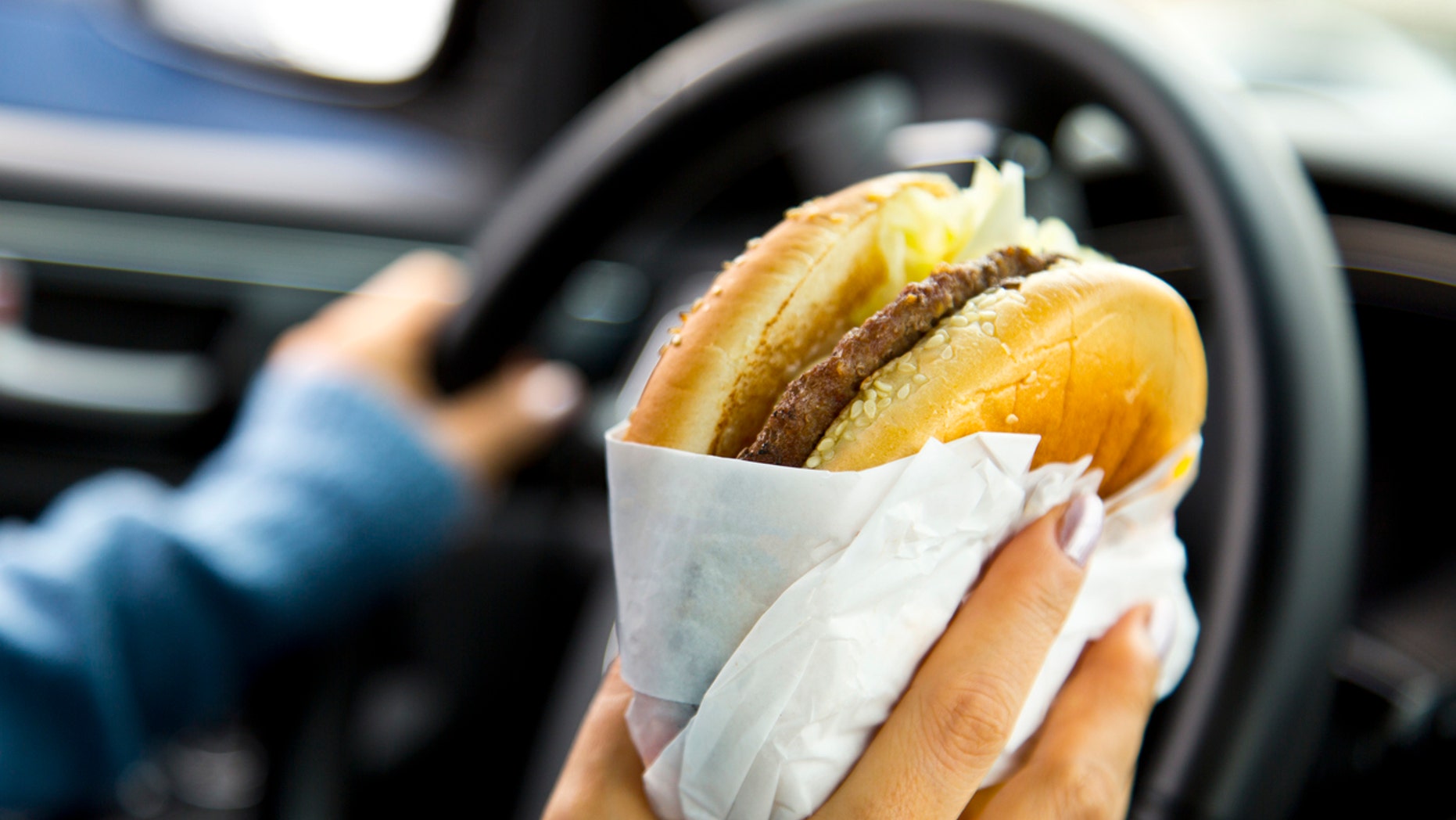 Eating Hamburger while driving