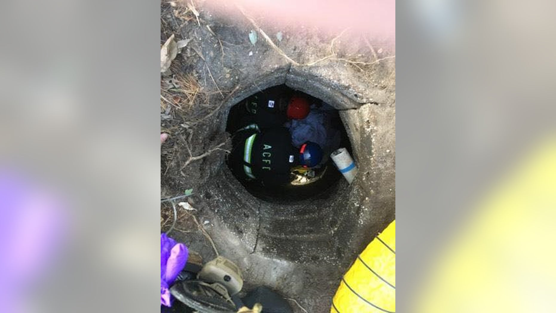 Firefighters rescued a woman who got stuck in a septic tank for three hours.