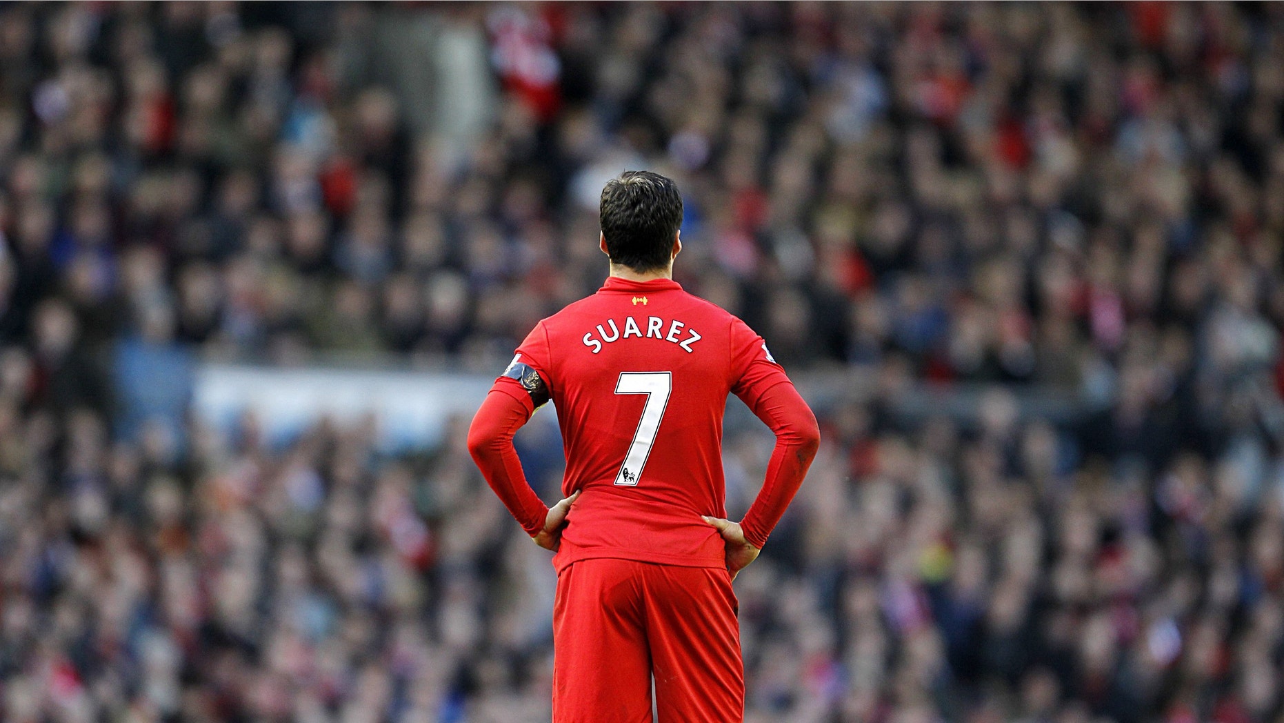 Liverpool's Luis Suarez is seen during his team's 2-2 draw against Chelsea in their English Premier League soccer match at Anfield Stadium, Liverpool, England, Sunday April 21, 2013. Suarez appeared to bite the arm of Chelsea's Branislav Ivanovic at the end of a tussle during the game. (AP Photo/PA, Peter Byrne) UNITED KINGDOM OUT NO ARCHIVE NO SALES