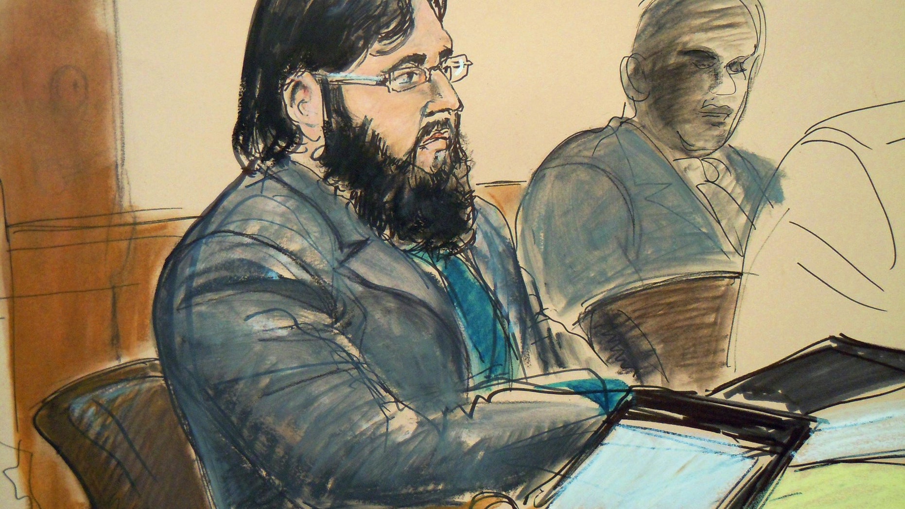 April 18: In this courtroom sketch, terror trial suspect Adis Medunjanin, accused in a foiled plot to attack New York City subways, sits in federal court in Brooklyn, New York.