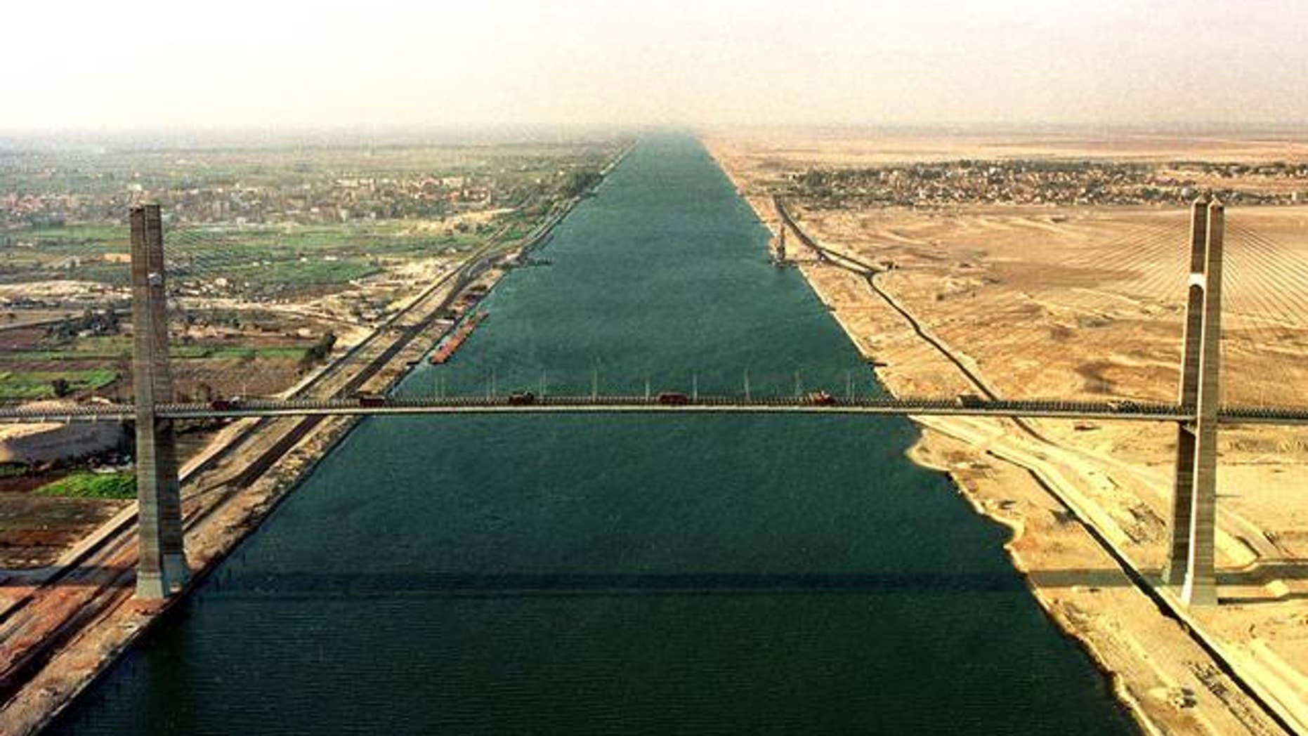 A 2001 file photo of the Suez Canal. Recent anti-presidential protests in Egypt have some concerned over whether or not ship traffic could be disrupted.