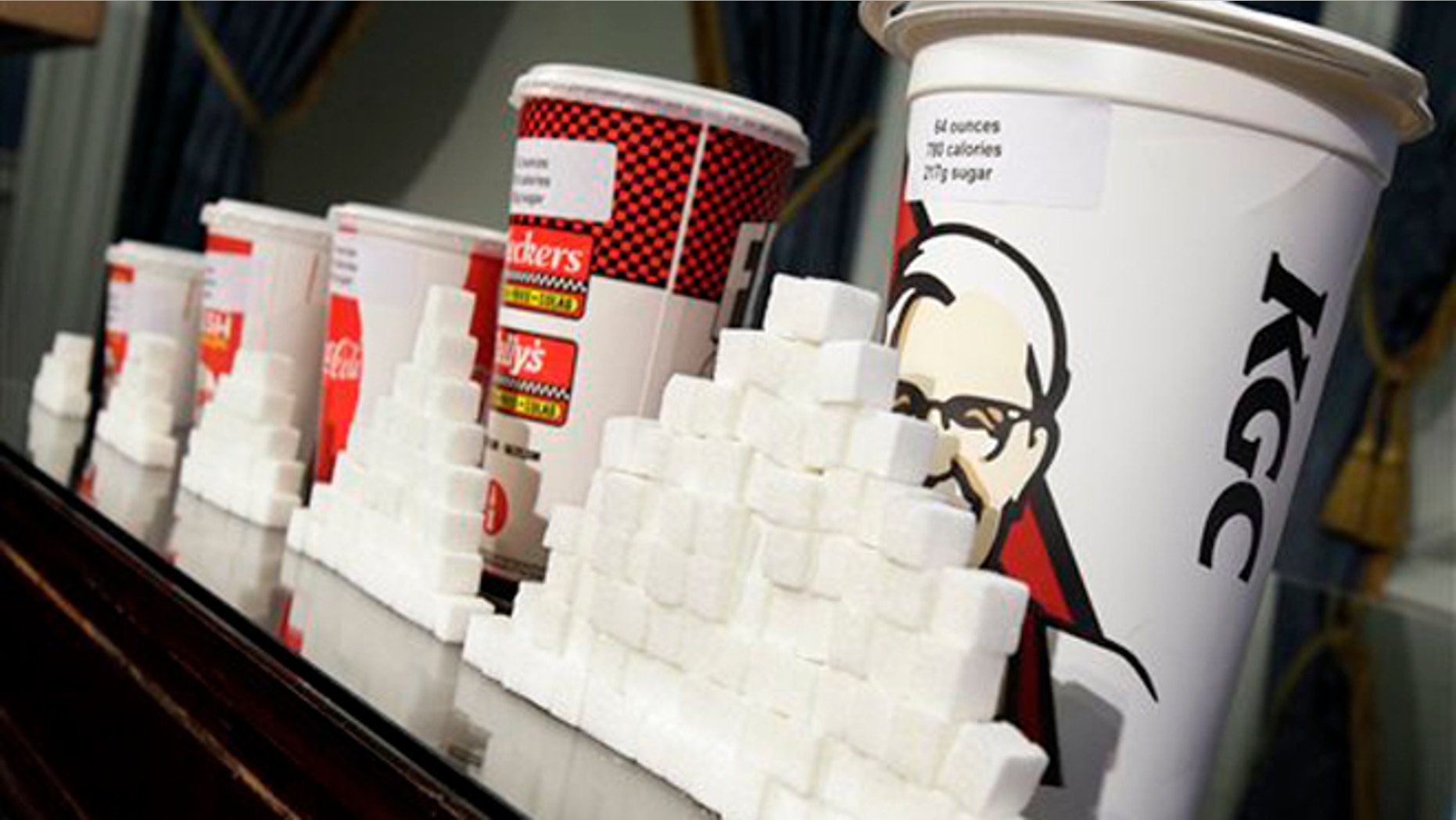 May 31, 2012: This photo shows a display of various size cups and sugar cubes at a news conference at New York's City Hall.