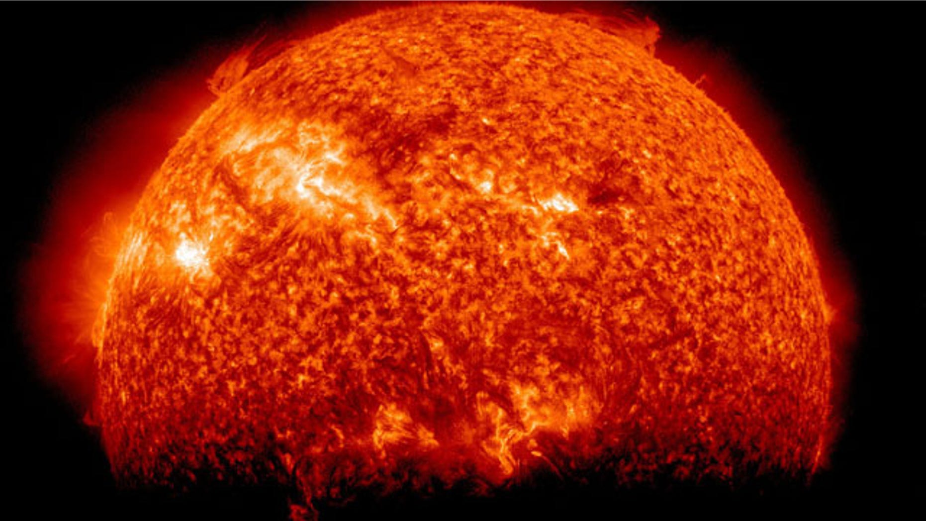 NASA's Solar Dynamics Observatory snapped this view of the sun fading into shadow as it slips behind the Earth from the spacecraft's vantage point on March 29, 2011. The image was taken during SDO's so-called eclipse season, when it flies behind Earth for up to 72 minutes of each day.