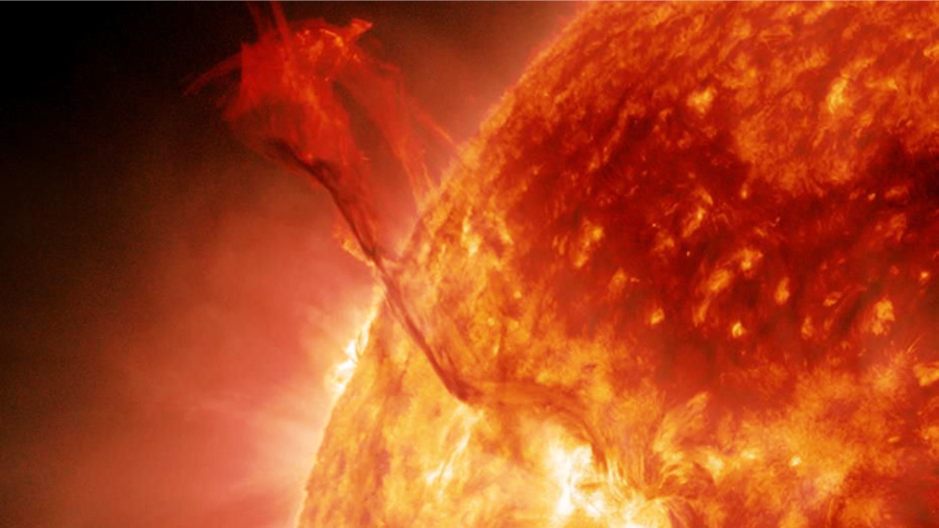 Jan. 31, 2013: A huge filament of super-hot plasma, nicknamed the "Dragon Tail," erupts from the sun in this still image from NASA's Solar Dynamics Observatory.