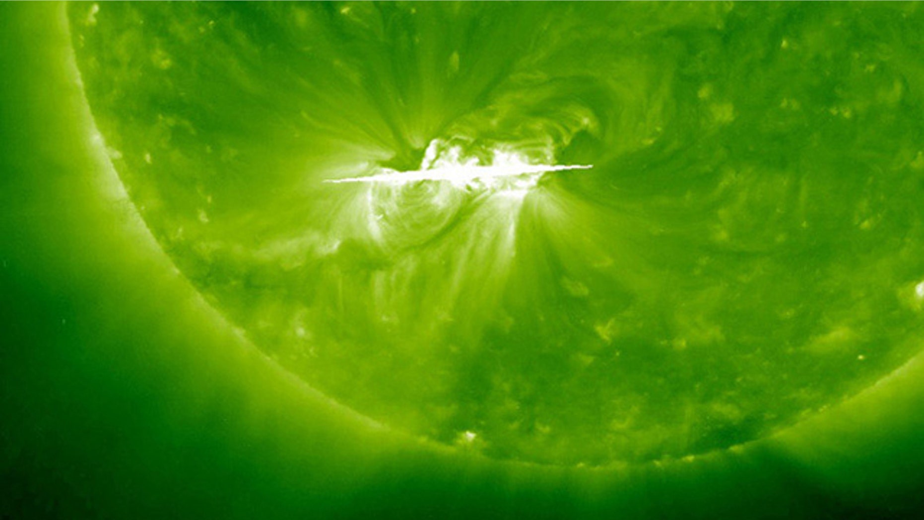 This image of the active sunspot group 1121 on the sun shows the solar hotspot as a bright white region in the lower left as seen by the sun-watching SOHO space observatory on Nov. 5, 2010.