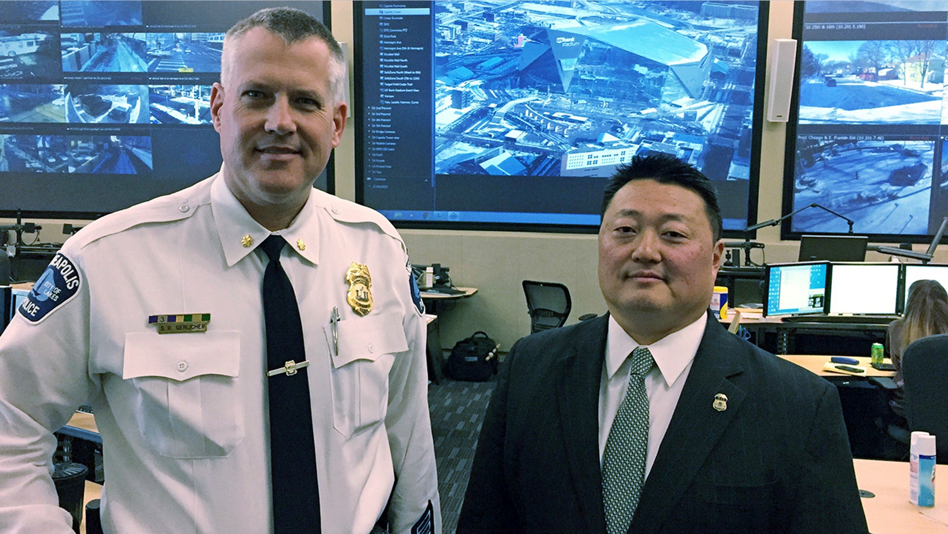 Minneapolis Police Commander Scott Gerlicher, left, and Homeland Security Investigations Special Agent in Charge Alex Khu, right, are heading up security preparations for the Super Bowl in Minnesota.