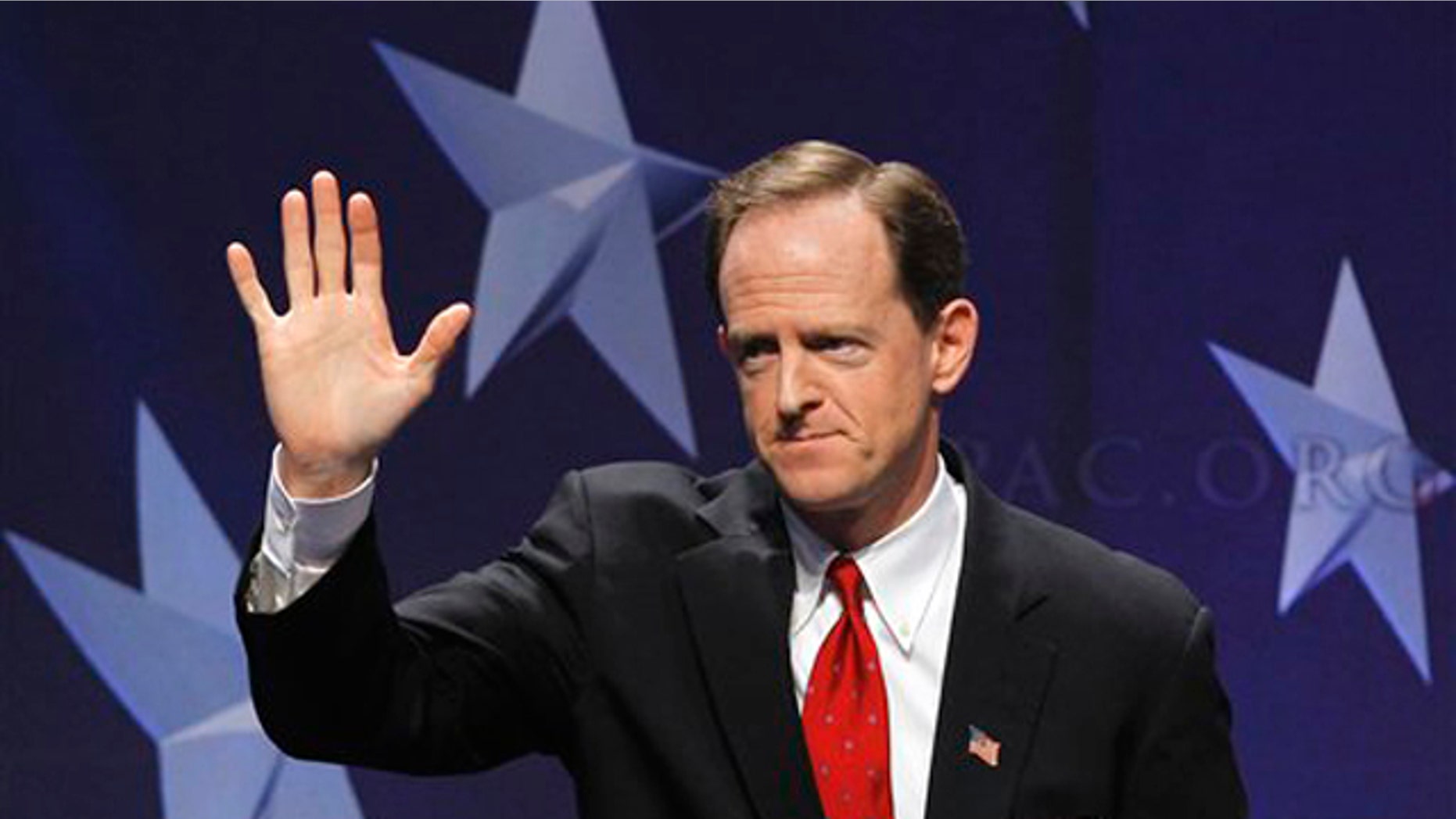 February 10, 2011: Sen. Pat Toomey, R-Pa. waves after addressing the Conservative Political Action Conference (CPAC) in Washington. Toomey is one of a dozen lawmakers on the debt supercommittee, given the task of producing a deficit-cutting plan of $1.5 trillion in savings over a decade.
