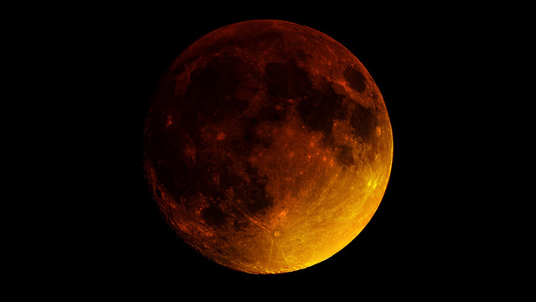 Sept. 27, 2015: A so-called 'supermoon eclipse' occurs New York City (Brian Tully)