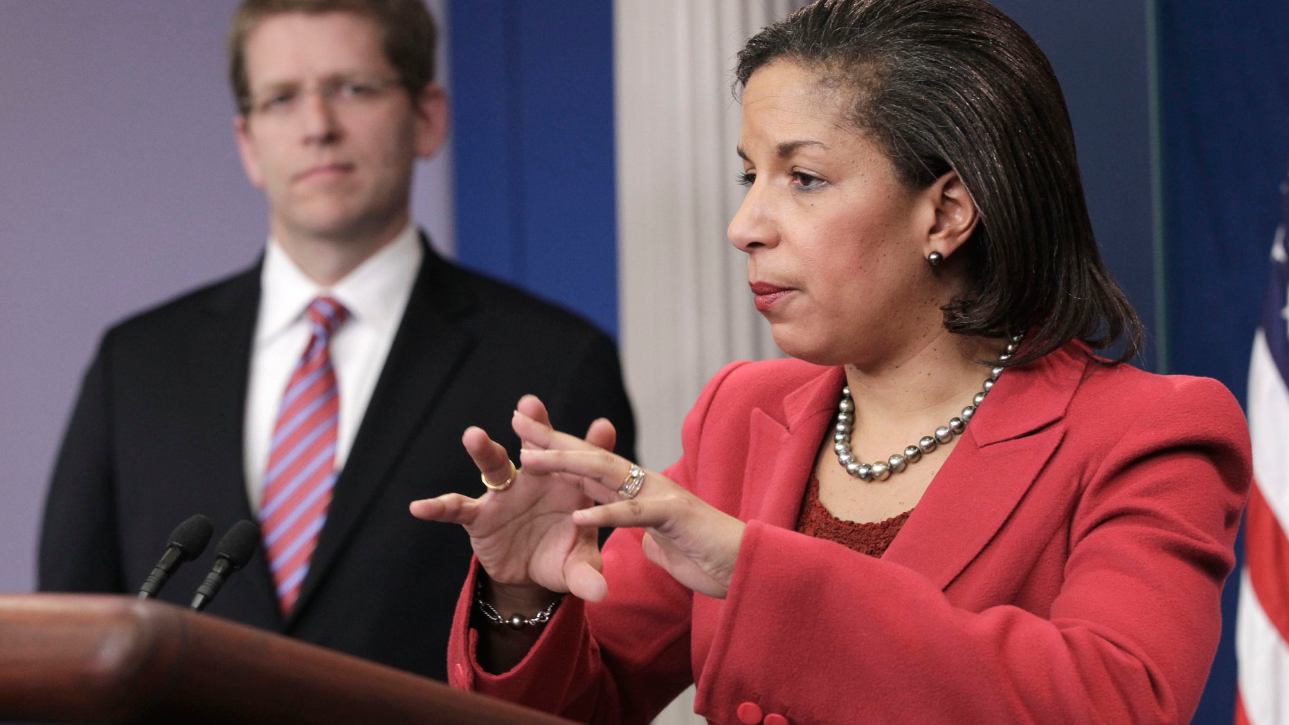 US Ambassador to the United Nations Susan Rice, right, accompanied by White House Press Secretary Jay Carney, gestures during the daily news briefing at the White House in Washington, Monday, Feb., 28, 2011. (AP)