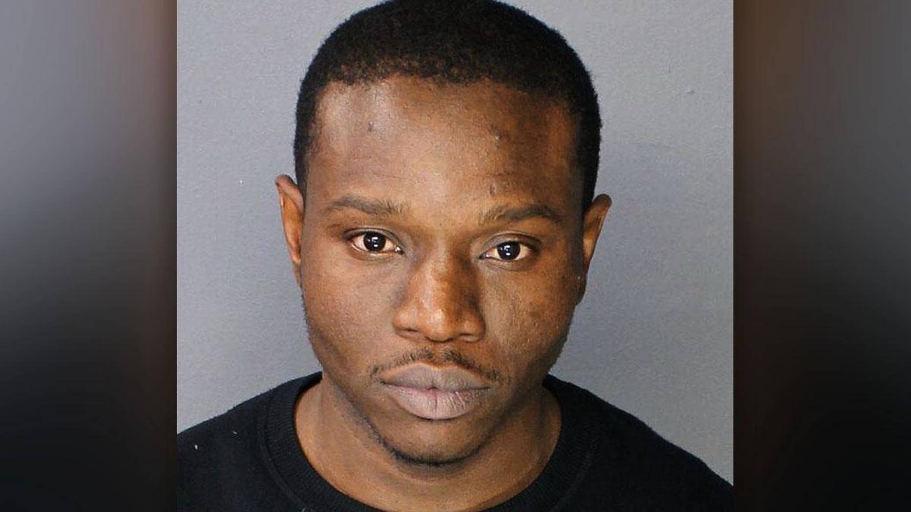 Suspect Ainsley Johnson, 34, allegedly bit off and swallowed a police officer's fingertip during a scufflle.