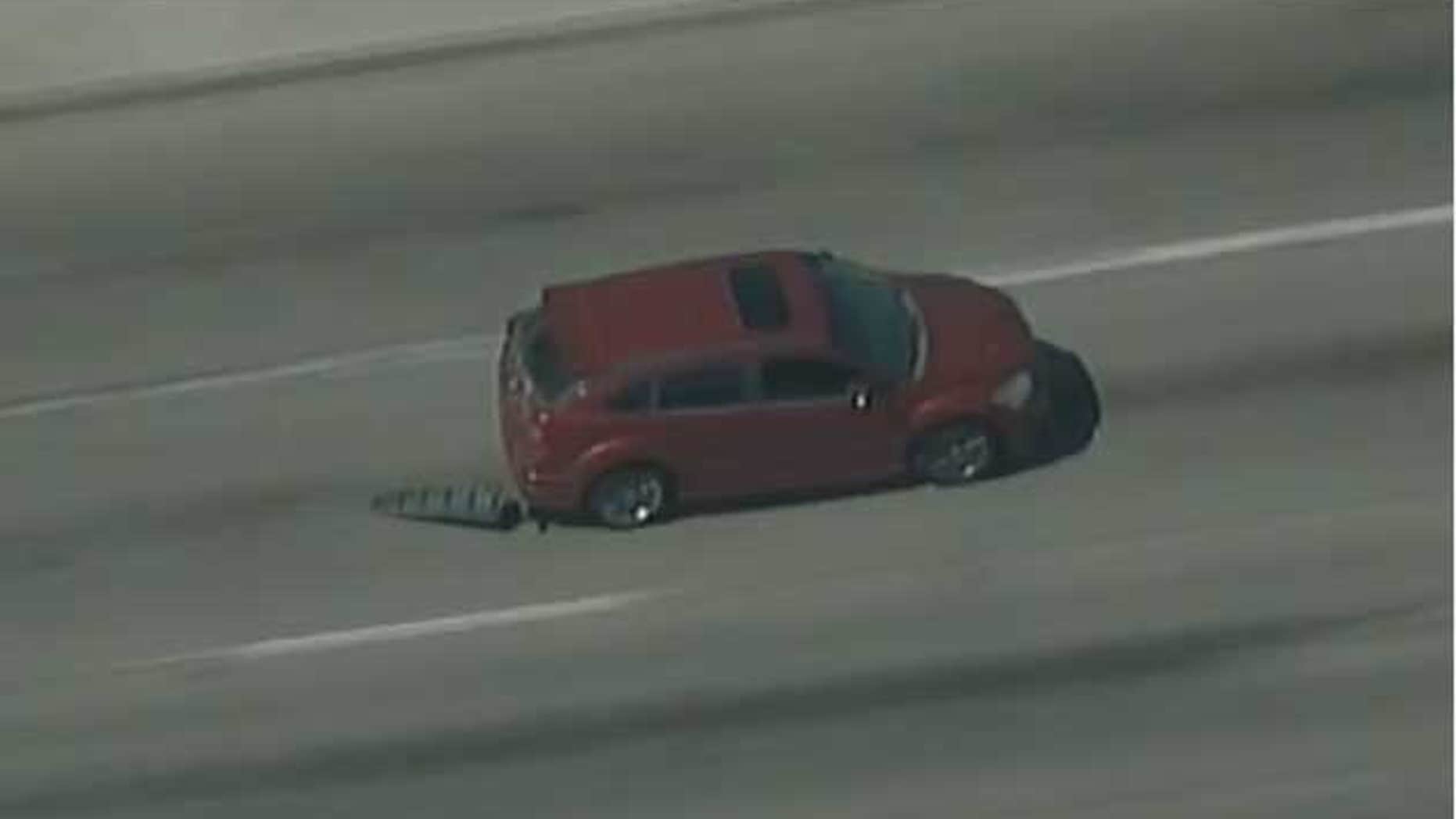 This photo shows the suspect leading police on a high speed chase in a stolen car.
