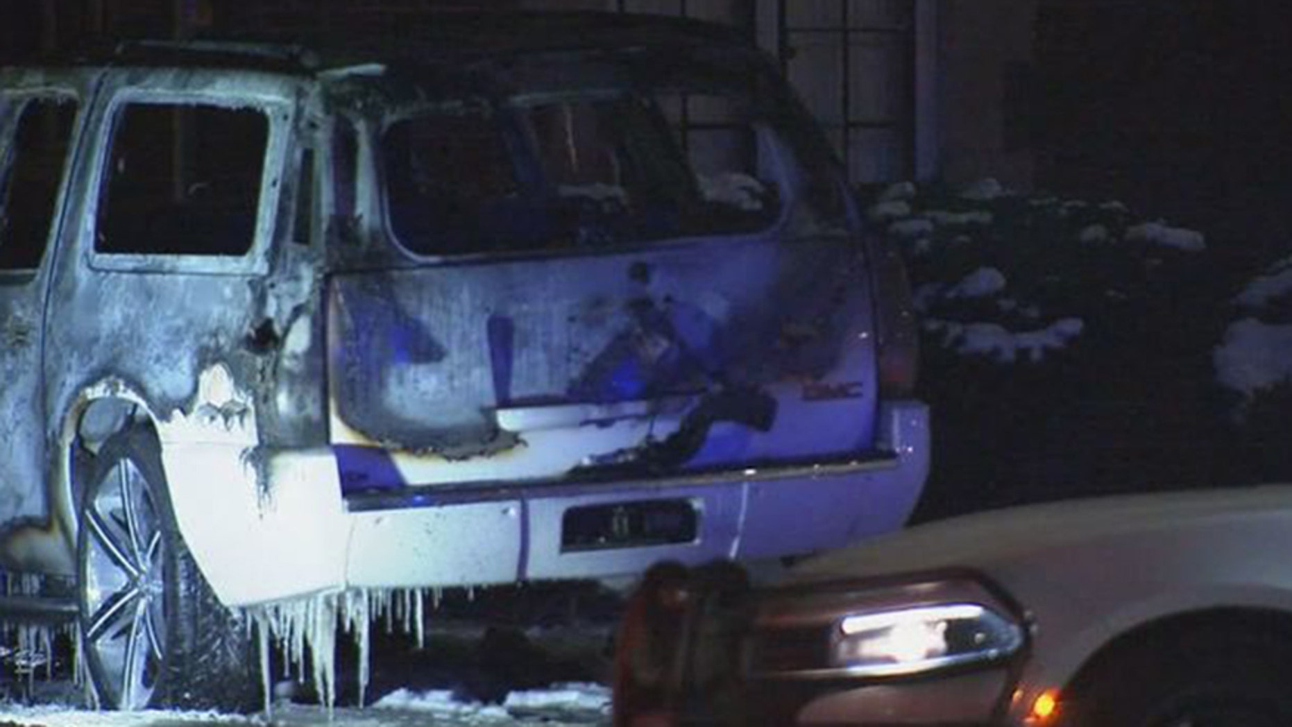A burning SUV with a body inside was found early Wednesday morning in Detroit.