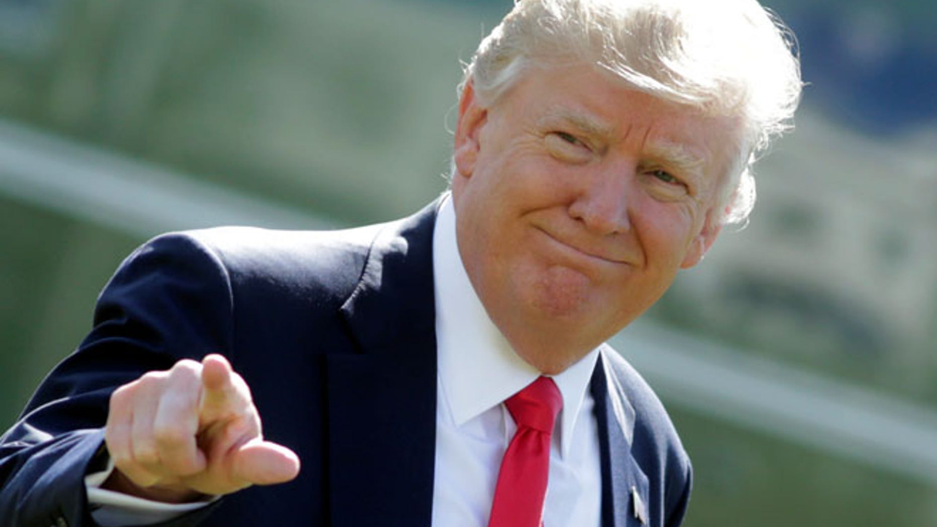 FILE: President Trump's administration downplayed a report from DHS focused on terrorism and his travl ban.
