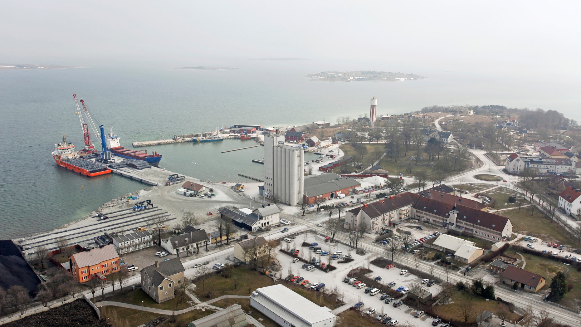 FILE _ This is a March 31, 2010 file photo of Slite harbor at the strategic island Gotland in Sweden. Officials on Sweden's militarily strategic Baltic Sea island of Gotland are mulling renting harbor space to a Russian company, even as the government warns that would be against the country's defense and political interests. (Soren Andersson/ TT, File via AP)