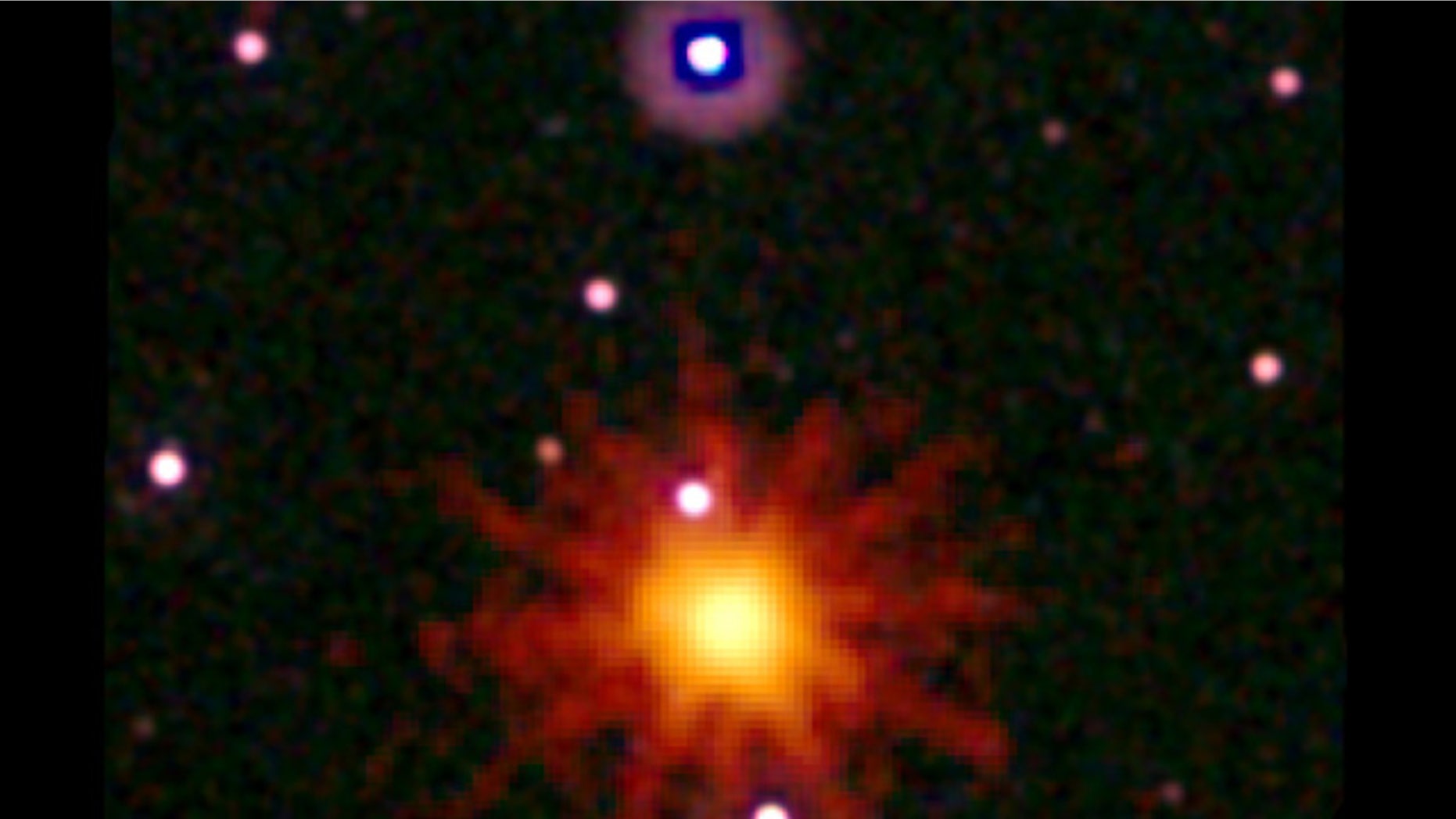 Images from NASA's Swift satellite were combined in this UV/optical/X-ray view of the explosion, which is known as GRB 110328A. The blast was detected in X-rays, which were collected on March 28.
