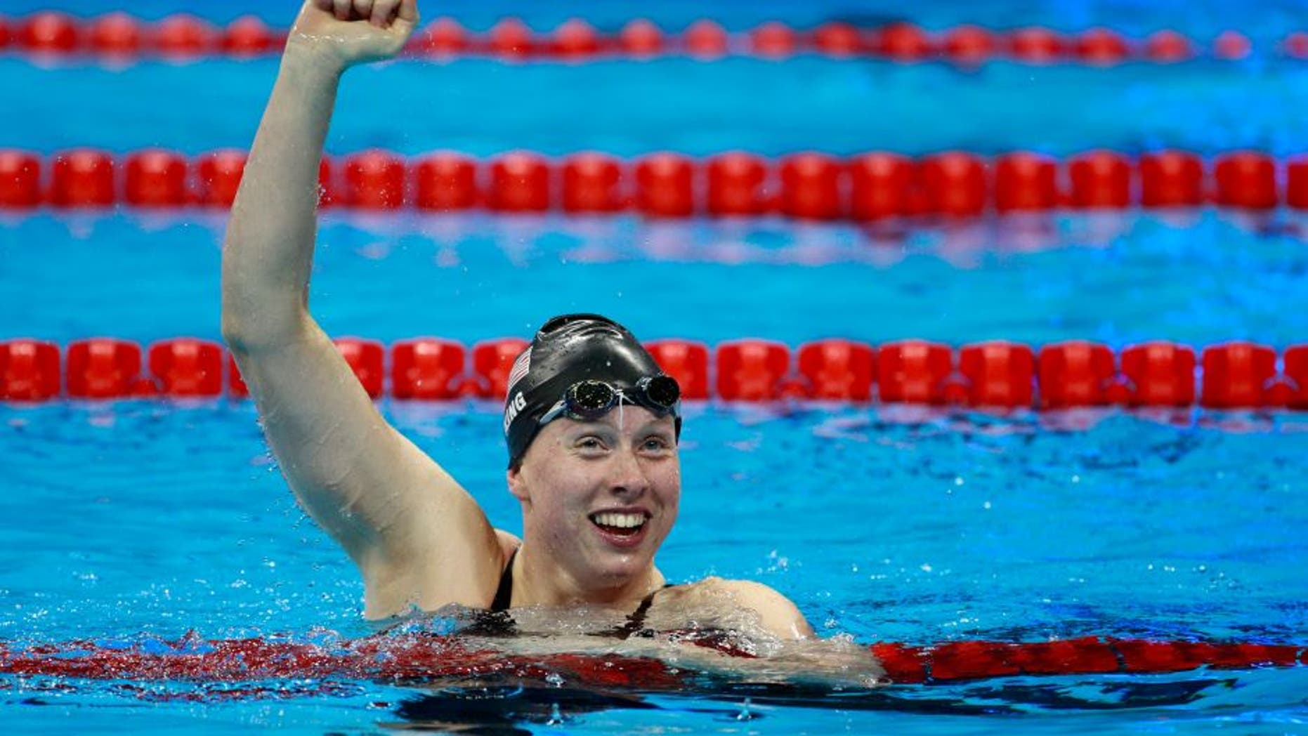 RIO DE JANEIRO, BRAZIL - AUGUST 08: Lilly King of the United States celebrates winning gold in the Women's 100m Breaststroke Final on Day 3 of the Rio 2016 Olympic Games at the Olympic Aquatics Stadium on August 8, 2016 in Rio de Janeiro, Brazil. (Photo by Adam Pretty/Getty Images)