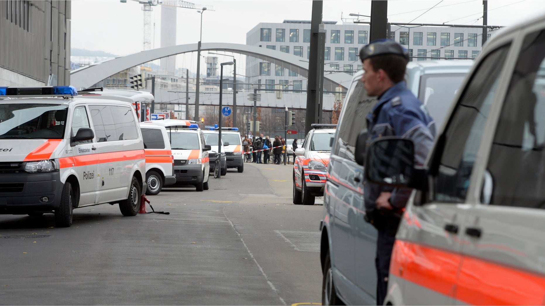 Dec. 4, 2014: Police cars wait outside the Zurich, Switzerland, university of art.