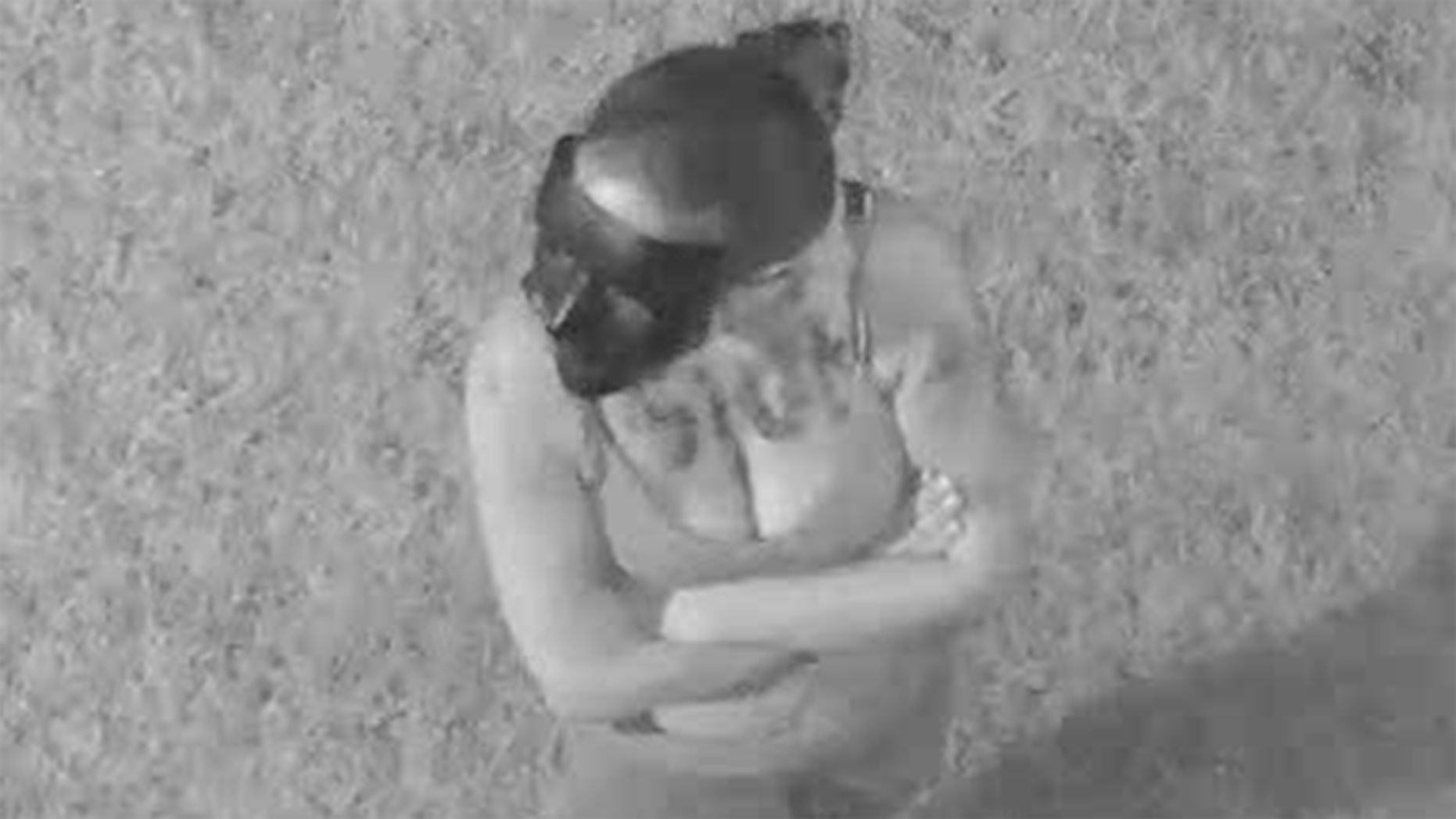 Nassau County police are searching for a masked woman in connection to anti-Semitic and profane graffiti at a New York high school.