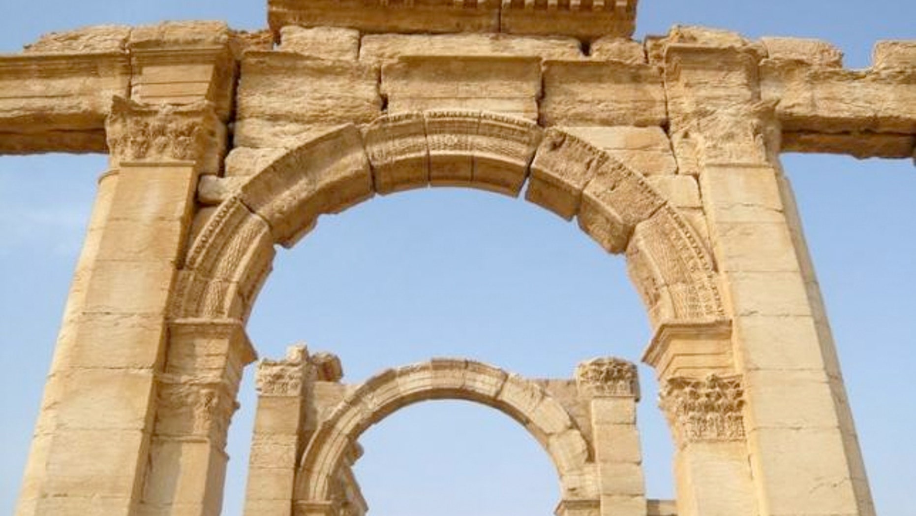 FILE: A view shows the Monumental Arch in the historical city of Palmyra, Syria, August 5, 2010. In Oct., ISIS blew up the monument, which is in the 2,000-year-old city of Palmyra.