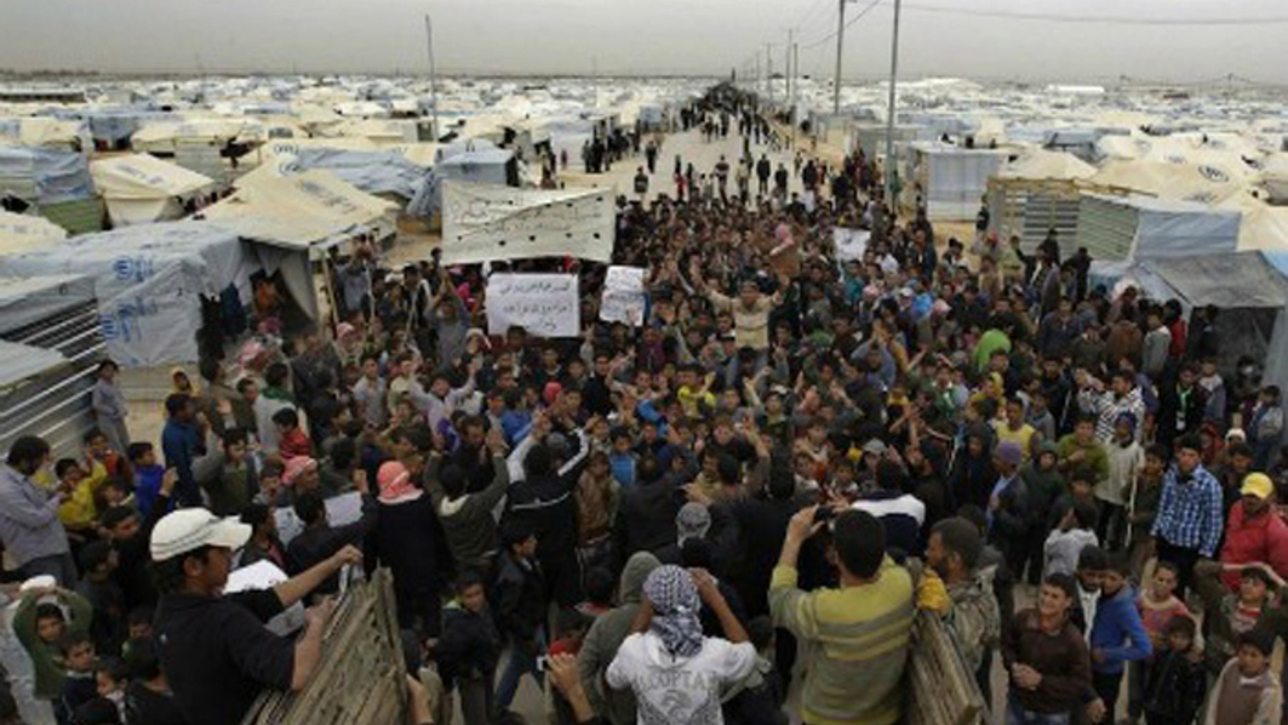 An estimated 500,000 Syrian refugees have fled to camps in Turkey. (AFP)