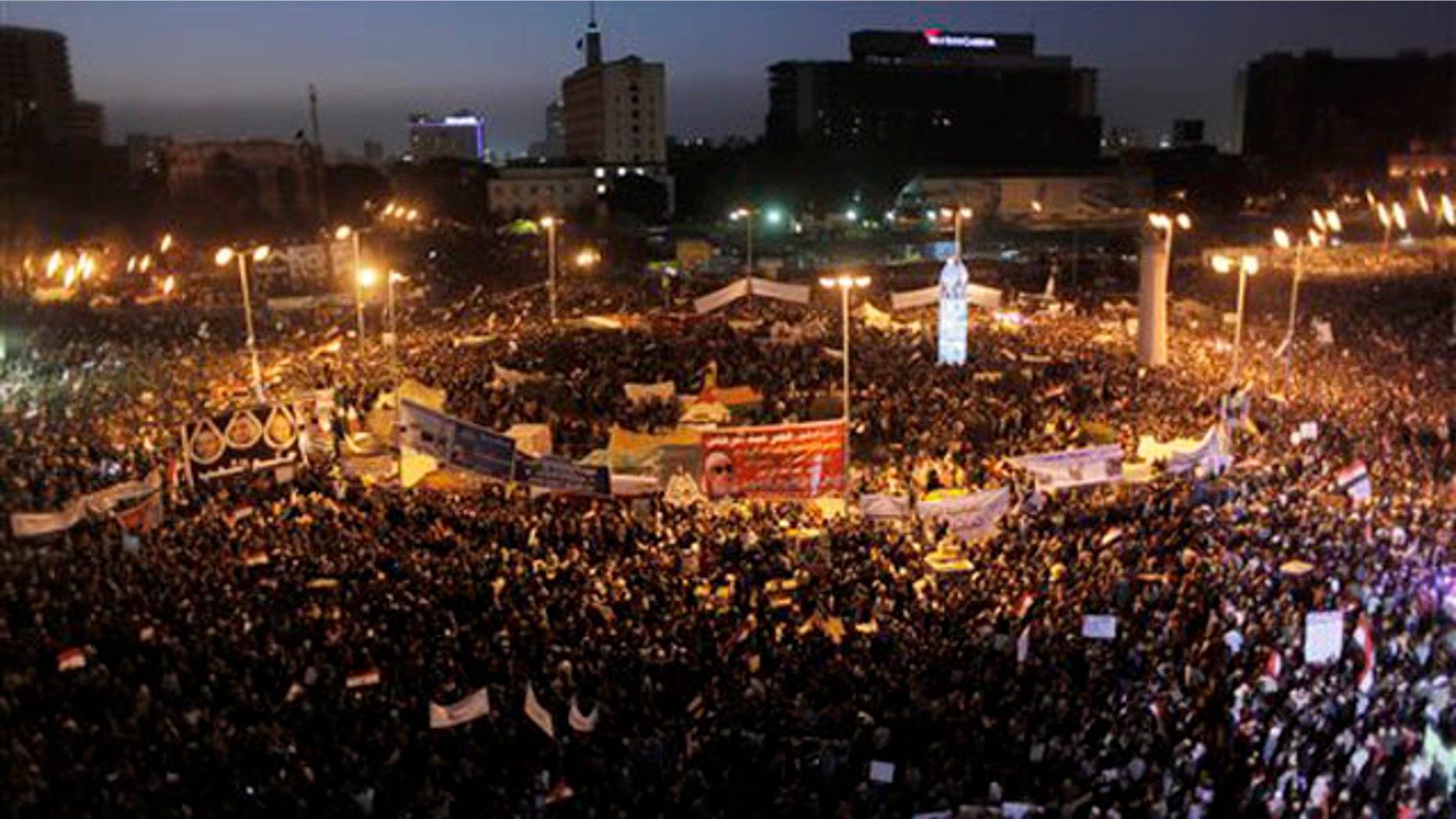 Jan. 25, 2012: Protesters fill Tahrir Square after sundown in Cairo, Egypt.