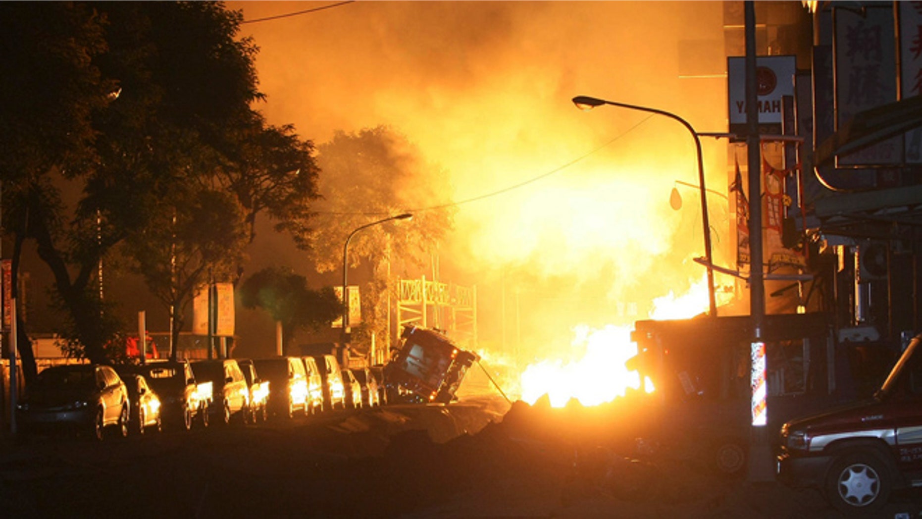 Aug. 1, 2014: Flames from an explosion from an underground gas leak in the streets of Kaohsiung, Taiwan.