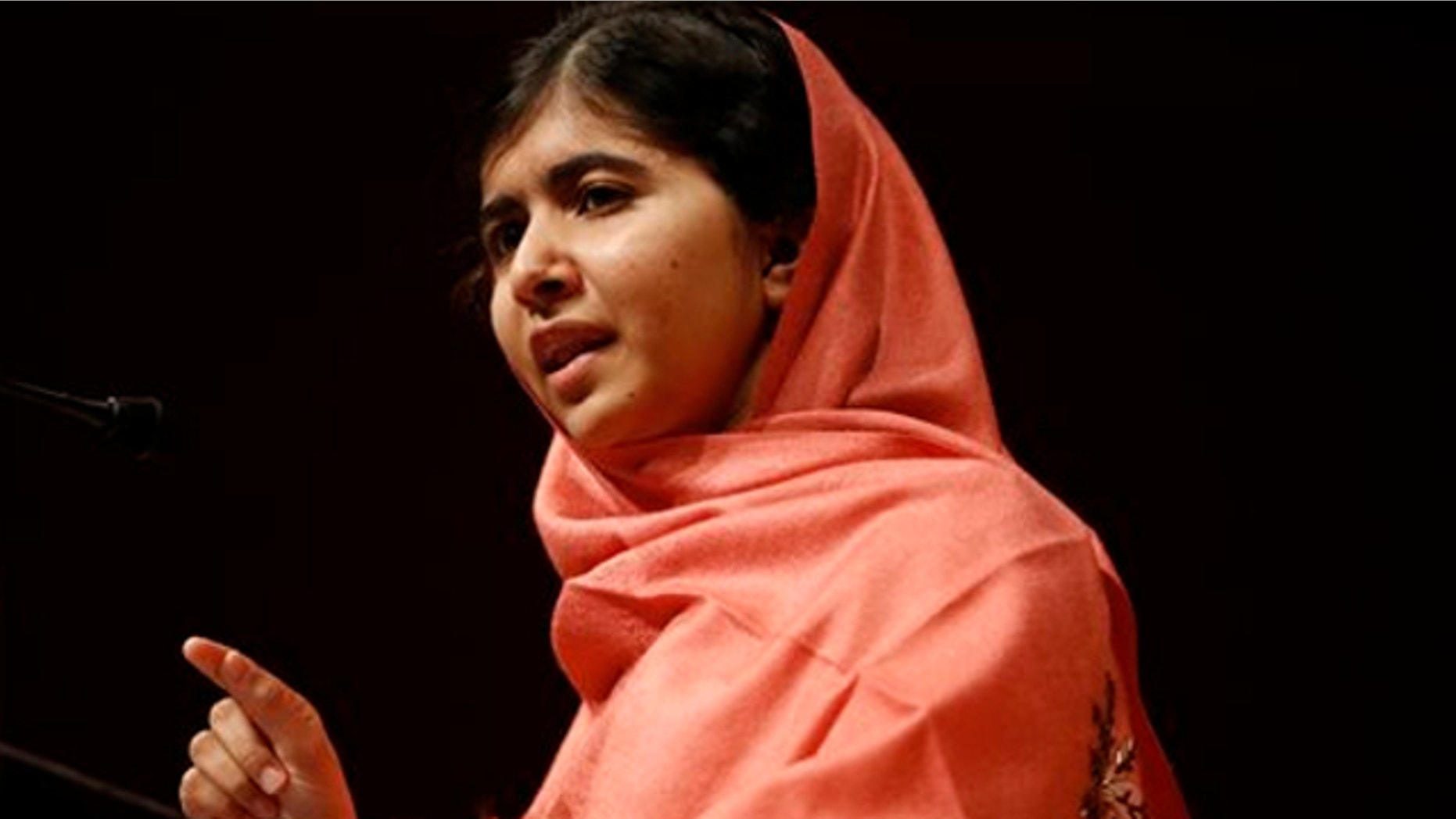 Sept. 27, 2013: Malala Yousafzai addresses students and faculty after receiving the 2013 Peter J. Gomes Humanitarian Award at Harvard University on the school's campus in Cambridge, Mass.