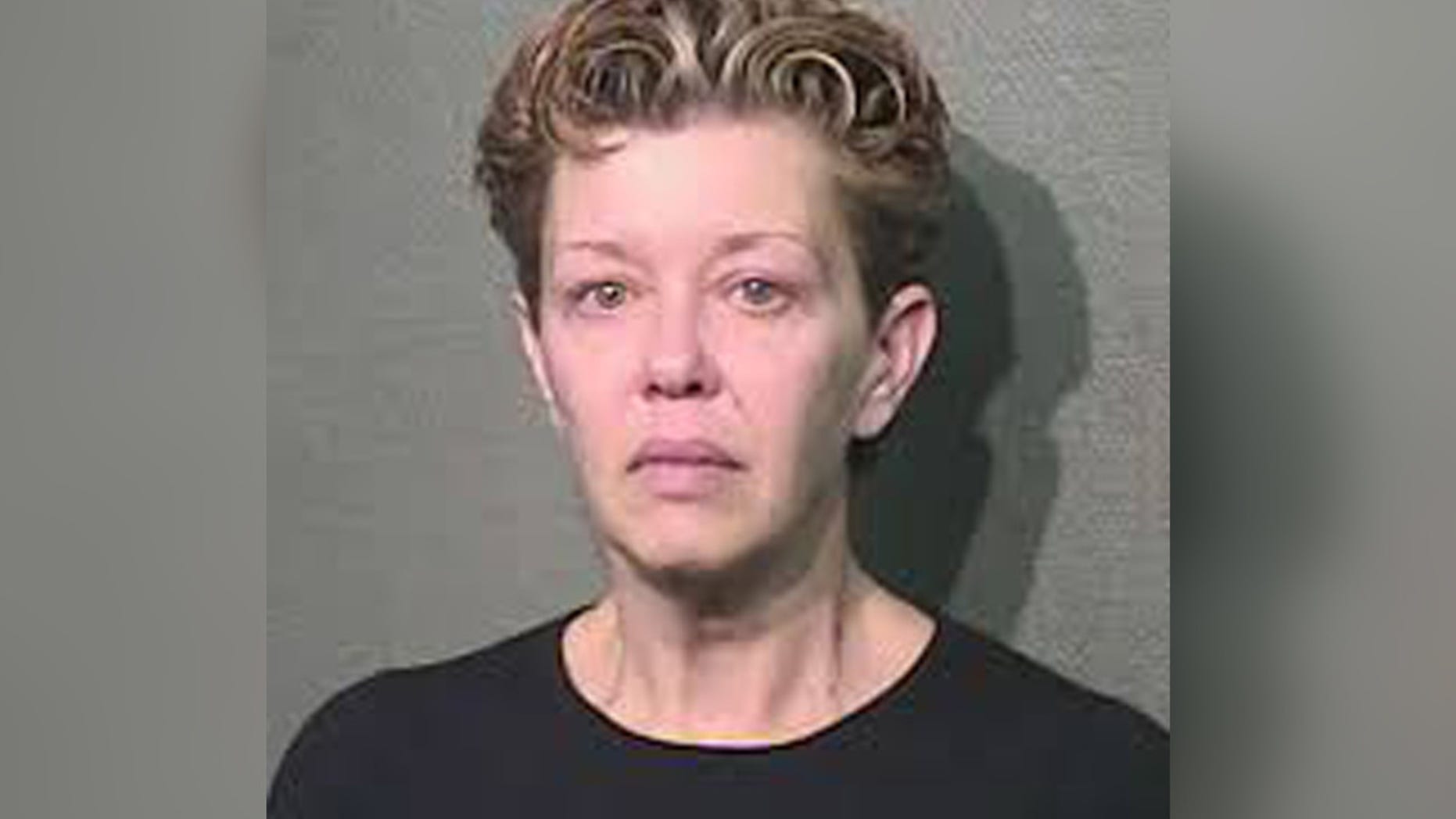 Tamantha Johnson, 48, allegedly posted a sex ad for her husband's girlfriend.