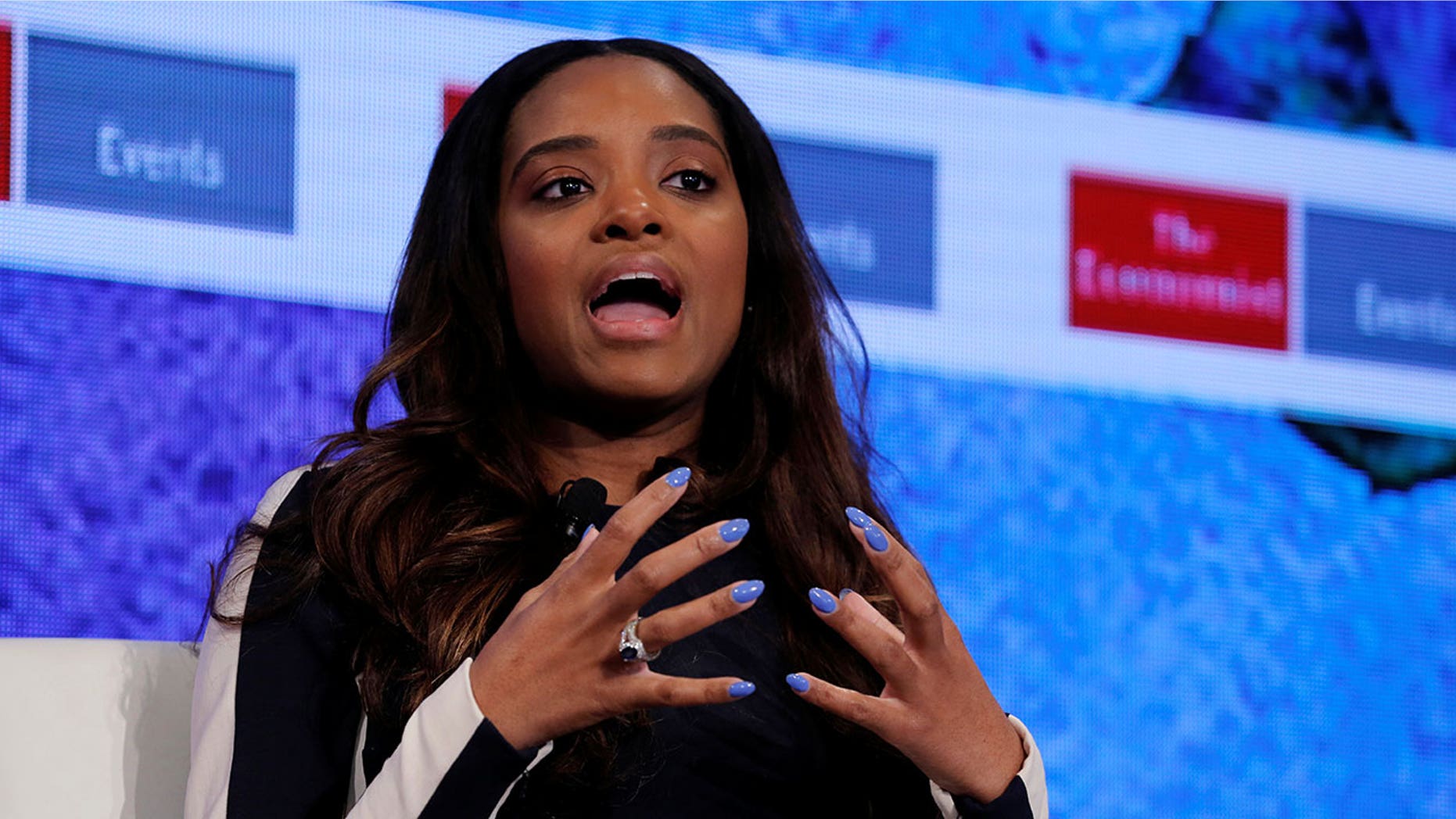 Mallory is accusing the pilot of discrimination, disrespect and intimidation.