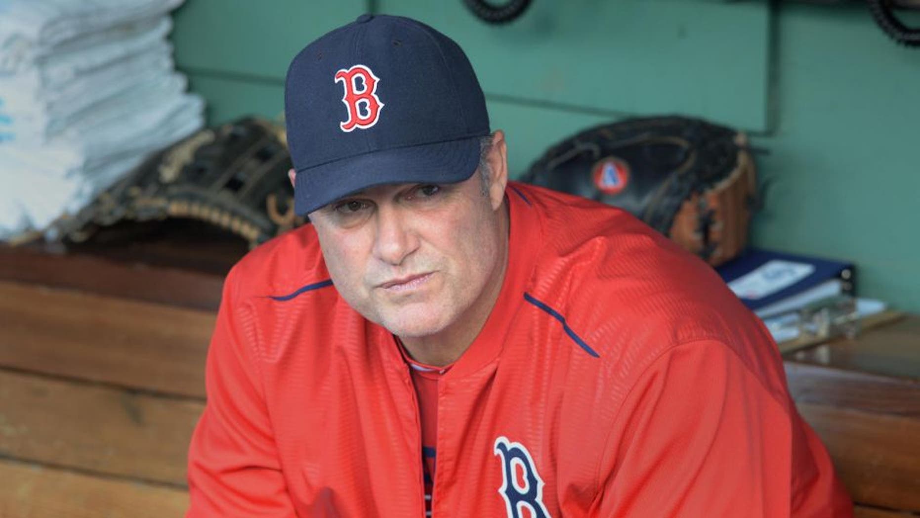 BOSTON, MA - MAY 4: John Farrell #53 of the Boston Red Sox in the dugout prior to their matchup against the Tampa Bay Rays at Fenway Park on May 4, 2015 in Boston, Massachusetts. The Rays won the game 5-1. (Photo by Darren McCollester/Getty Images)