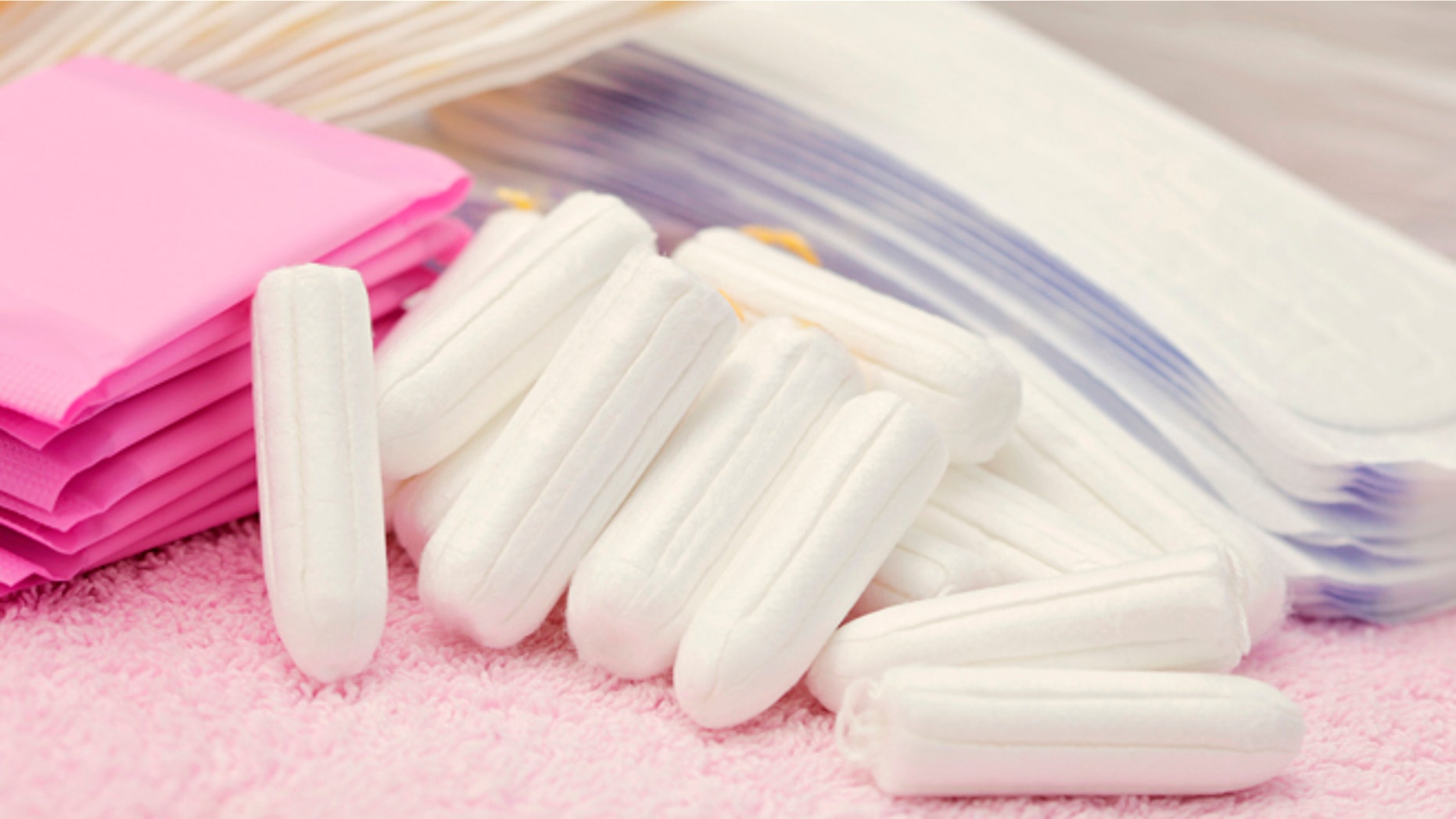 Grant alleges the trouble started when she unwrapped a Playtex Gentle Glide tampon and saw a black dot on it.