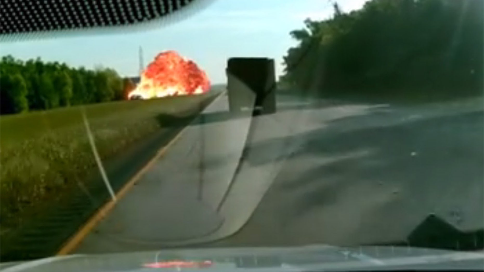 Screengrab of a dashcam video showing an intense crash and explosion in Louisiana.