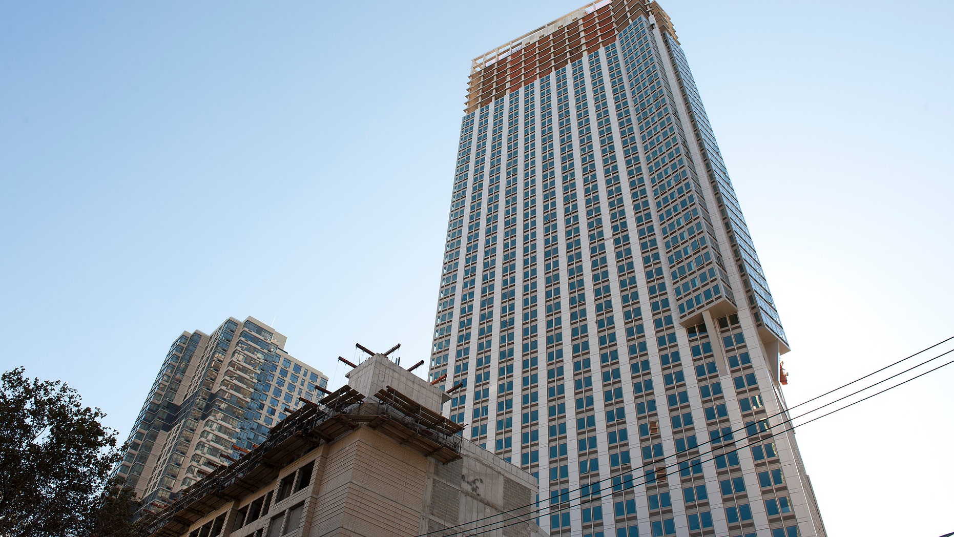 Nov. 3, 2014: This photo shows a construction site in Jersey City, N.J., where a man delivering sheet rock at the site was killed when a tape measure fell 50 stories and struck him in the head. (AP/The Jersey Journal, Reena Rose Sibayan)