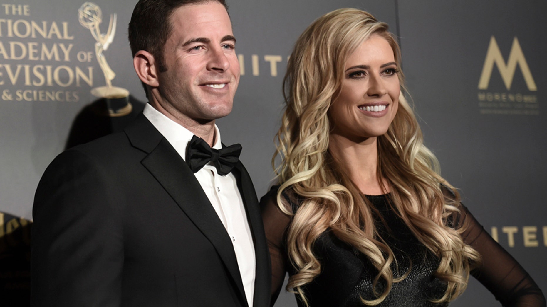 Tarek El Moussa, left, says his ex-wife Christina El Moussa helped him through his cancer battles.