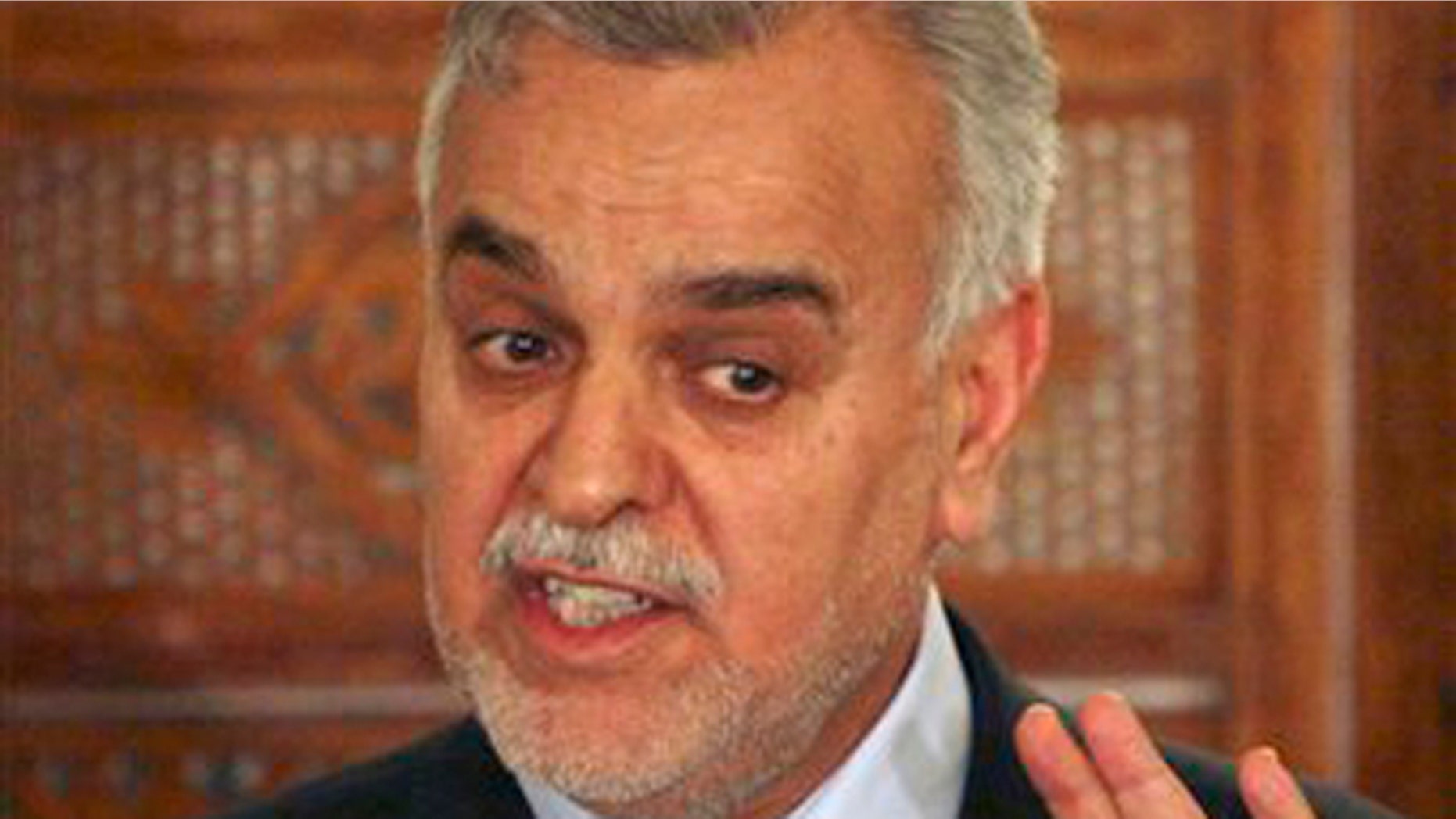 In this Wednesday, Sept. 26, 2007, file photo, Iraq's vice President Tariq al-Hashemi speaks to reporters during a news conference in Baghdad, Iraq. Iraq's Shiite-led government has issued an arrest warrant Monday Dec. 19, 2011, for Vice President Tariq al-Hashemi, the country's highest ranking Sunni official, on alleged terrorism charges.