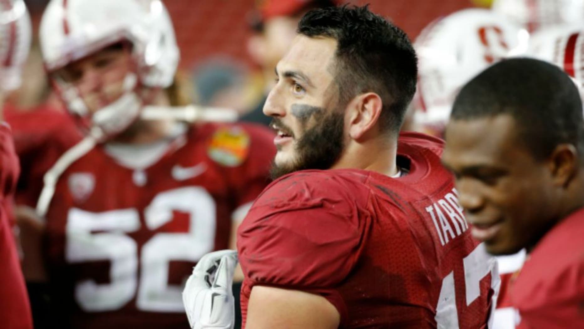 SAN FRANCISCO, CA - DECEMBER 30: A.J. Tarpley #17 of the Stanford Cardinal eyes the scoreboard during the inaugural Foster Farms Bowl against the Maryland Terrapins at Levi's Stadium on December 30, 2014 in San Francisco, California. (Photo by Tom Dahlin/Getty Images)