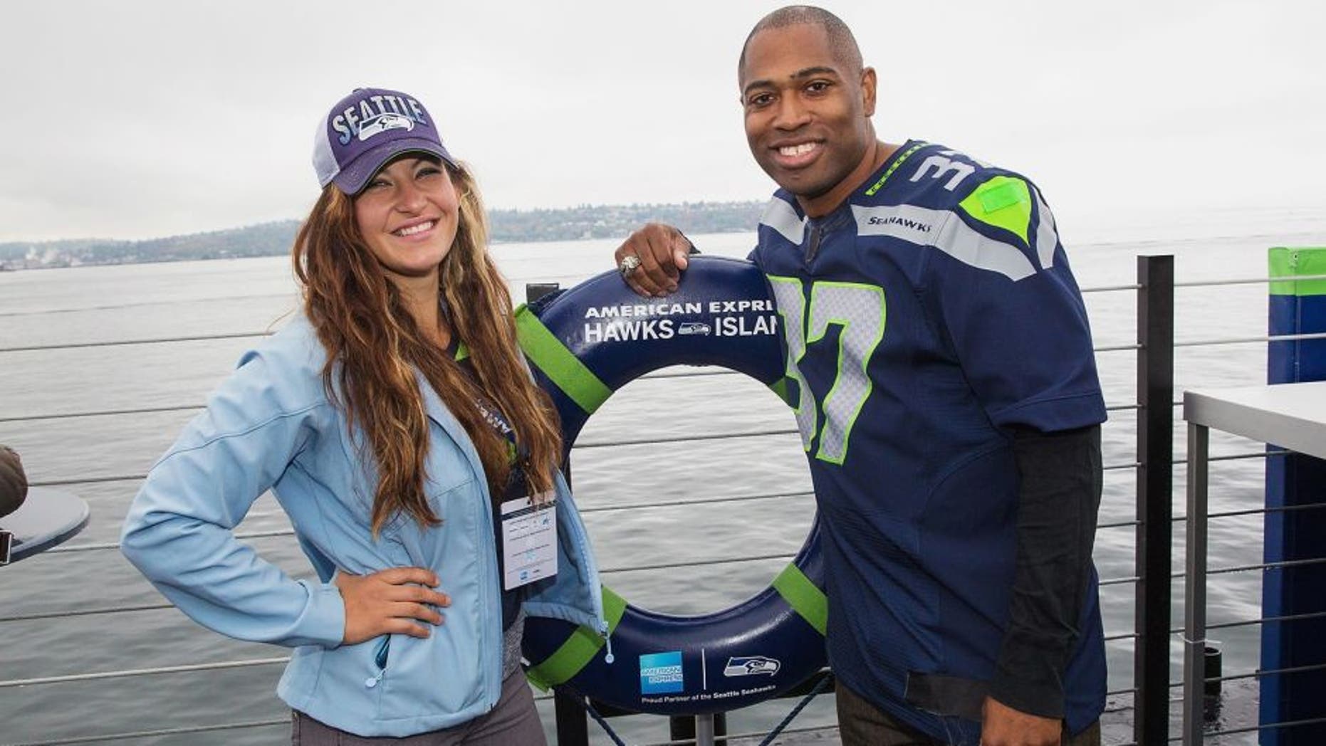 SEATTLE, WA - OCTOBER 18: UFC Mixed Martial Arts Fighter Miesha Tate and Seattle Seahawks Legend Shaun Alexander attend the American Express hosted, never-before-seen pre-game experience for Seattle Seahawks fans and Card Members called American Express Hawks Island on a barge on the Puget Sound. on October 18, 2015 in Seattle, Washington. (Photo by Mat Hayward/Getty Images for American Express)