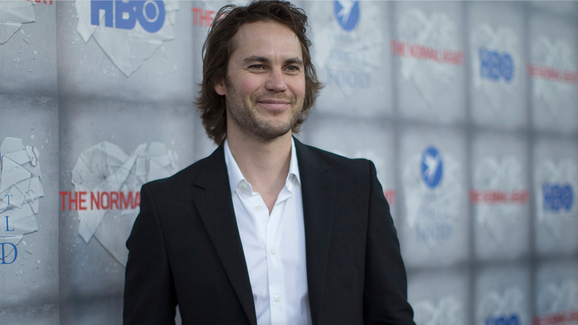 Taylor Kitsch plays cult leader David Koresh in the mini-tv series "Waco."