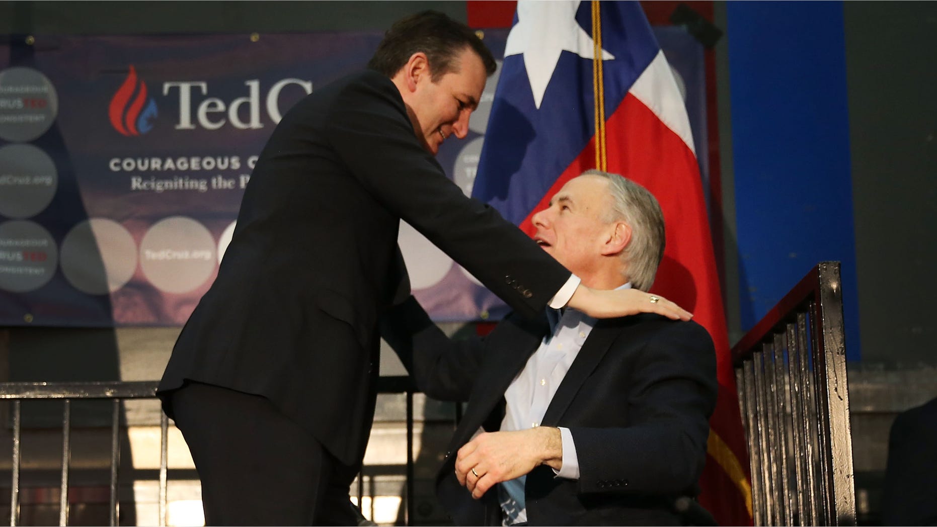 HOUSTON, TX - FEBRUARY 24: Texas Governor, Greg Abbott, (R) greets Republican presidential candidate U.S. Sen. Ted Cruz (R-TX) during a campaign rally where the Texas governor endorsed him at the Mach Industrial Group on February 24, 2016 in Houston, Texas. The process to select the next Democratic and Republican Presidential candidates continues. (Photo by Joe Raedle/Getty Images)