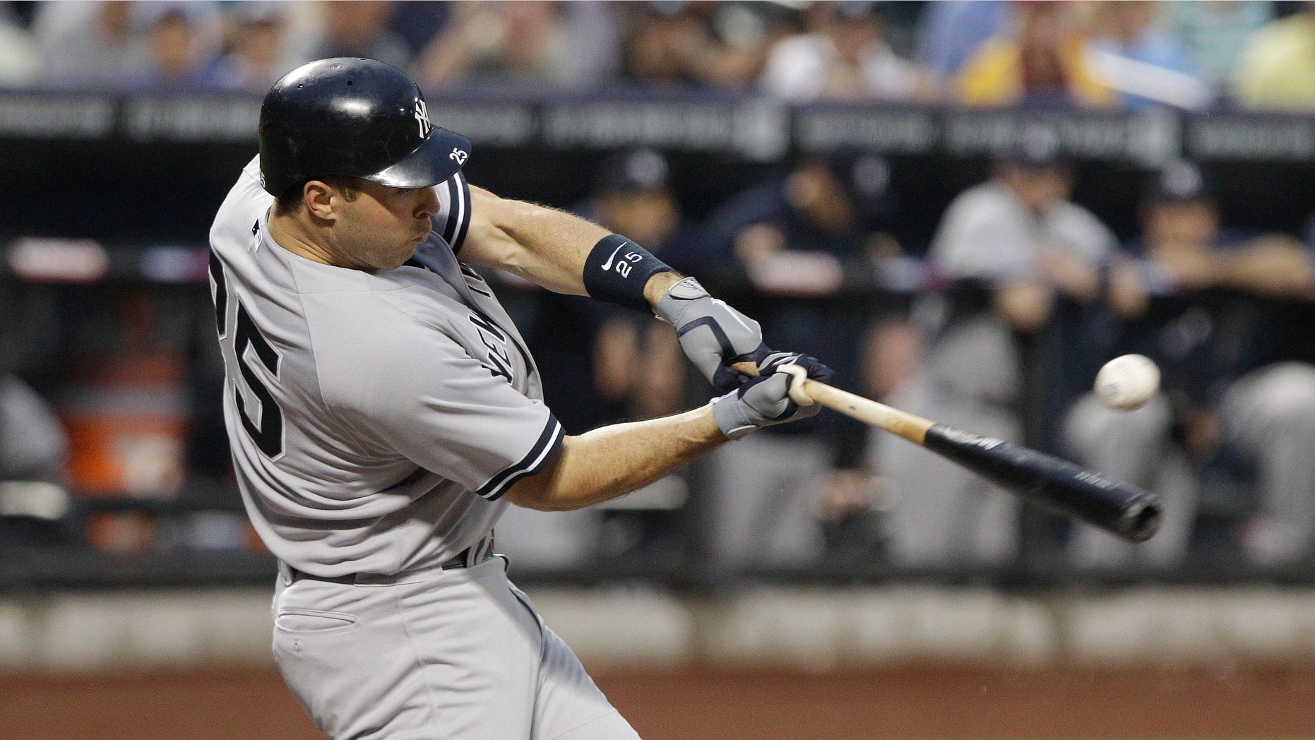 New York Yankees' Mark Teixeira hits a single during the first inning of an interleague baseball game against the New York Mets, Friday, June 22, 2012, in New York. (AP Photo/Frank Franklin II)