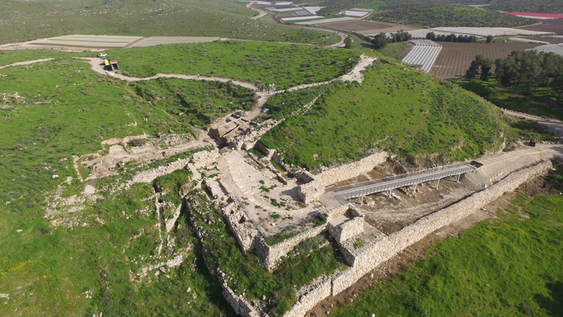 The gate structure, seen to the left, exposed at Tel Lachish National Park.