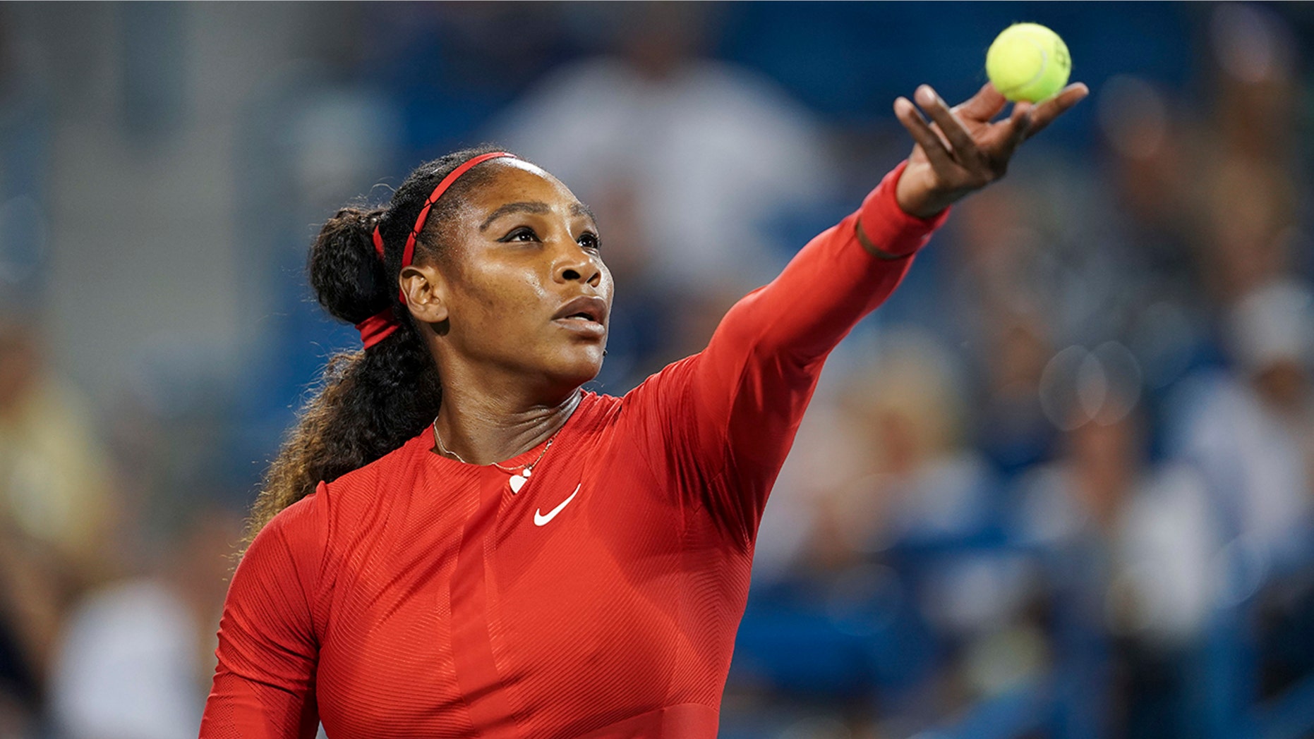 Serena Williams serves to Petra Kvitova, of the Czech Republic, at the Western & Southern Open tennis tournament.