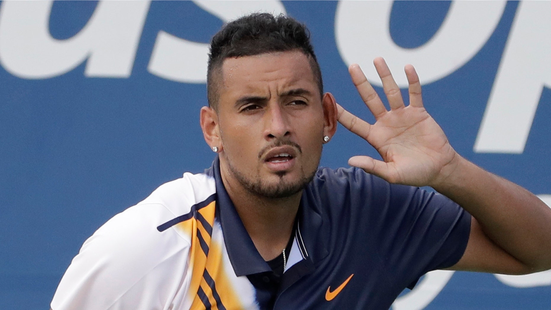 Nick Kyrgios, of Australia, reacts against Pierre-Hugues Herbert, of France, during the second round of the U.S. Open tennis tournament.