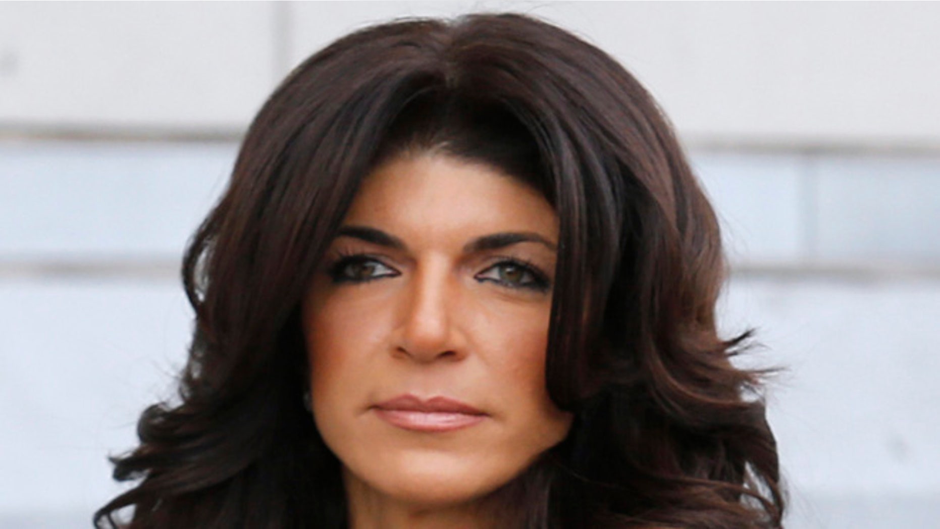 March 4, 2014. Teresa Giudice, 41, exits the Federal Court in Newark, New Jersey.