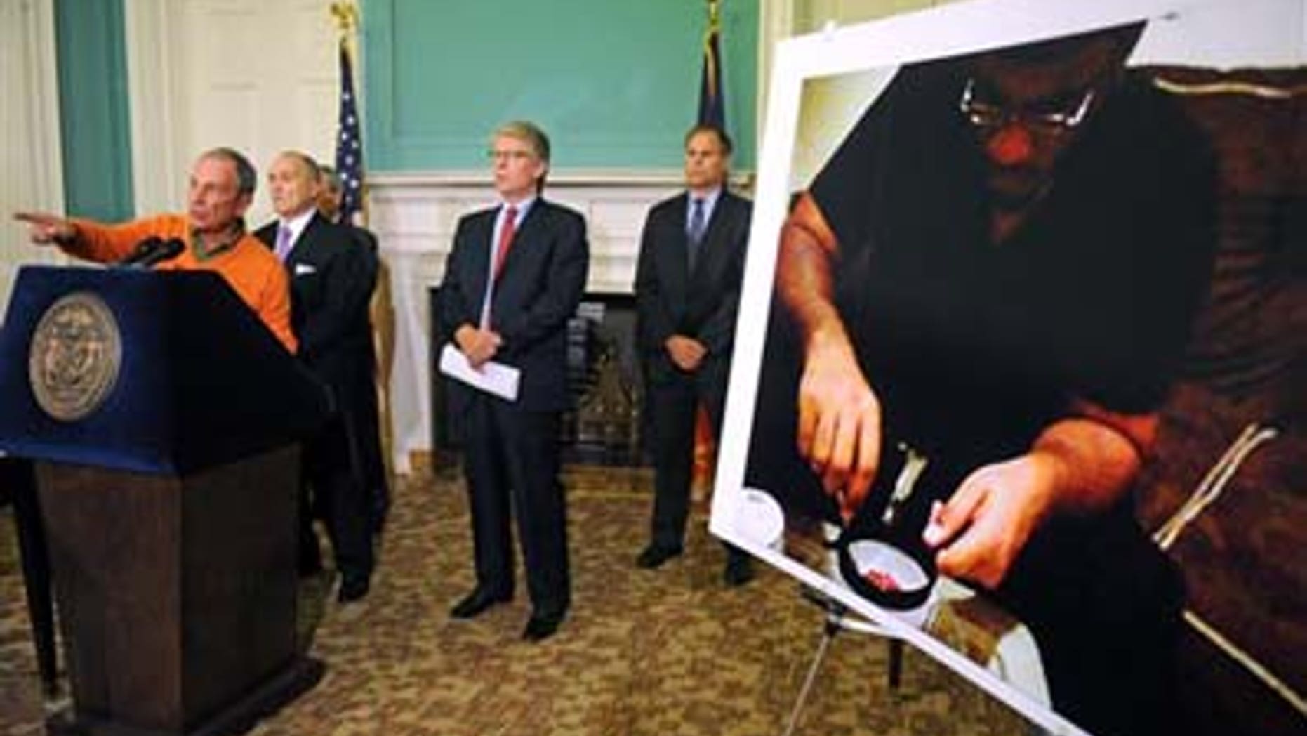 Nov. 20, 2011: Mayor Michael Bloomberg speaks to the media at a City Hall press conference in New York. Bloomberg announced that Jose Pimentel, pictured at right, had been arrested on numerous terrorism-related charges.