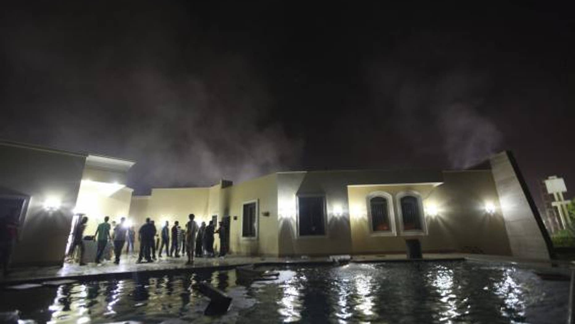 Damage at the U.S. Consulate in Benghazi is seen during a protest by an armed group said to have been protesting a film being produced in the United States in this September 11, 2012 file photo. REUTERS/Esam Al-Fetori/Files
