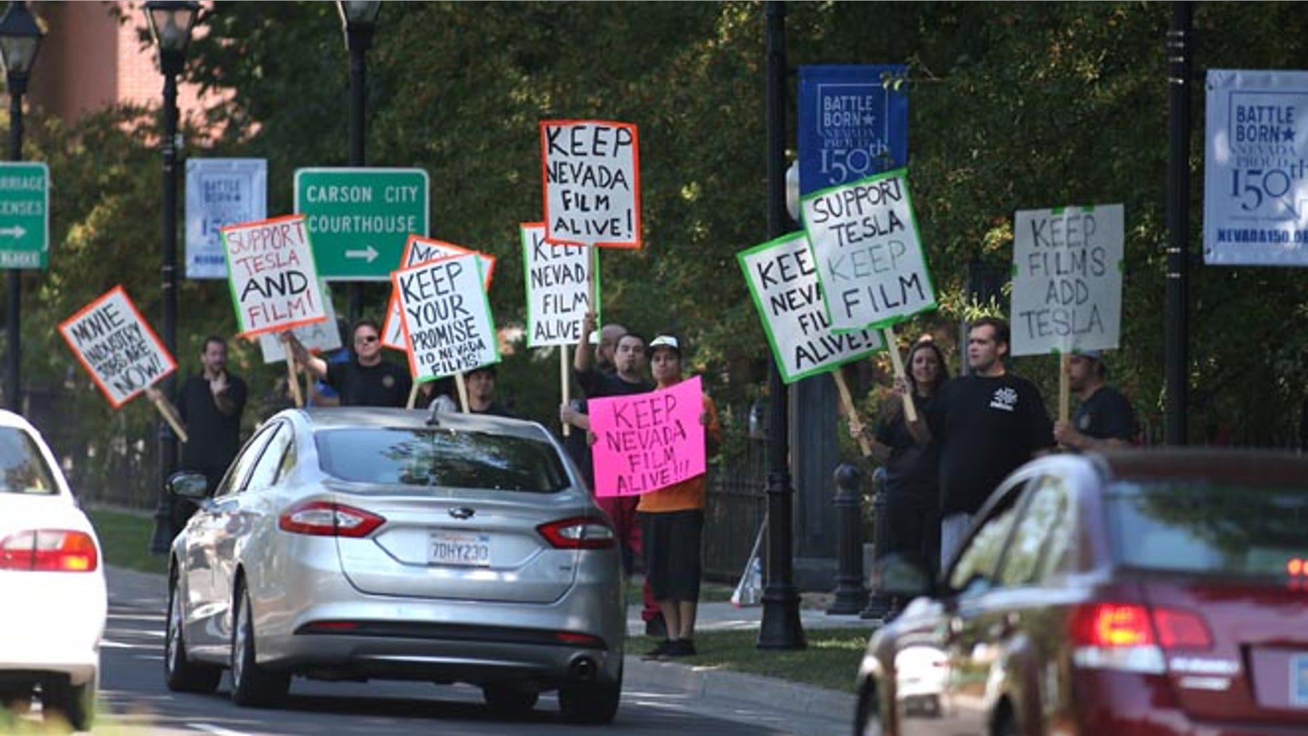 Sept. 10, 2014: Protesters march in front of the Capitol in Carson City, Nev. (AP)