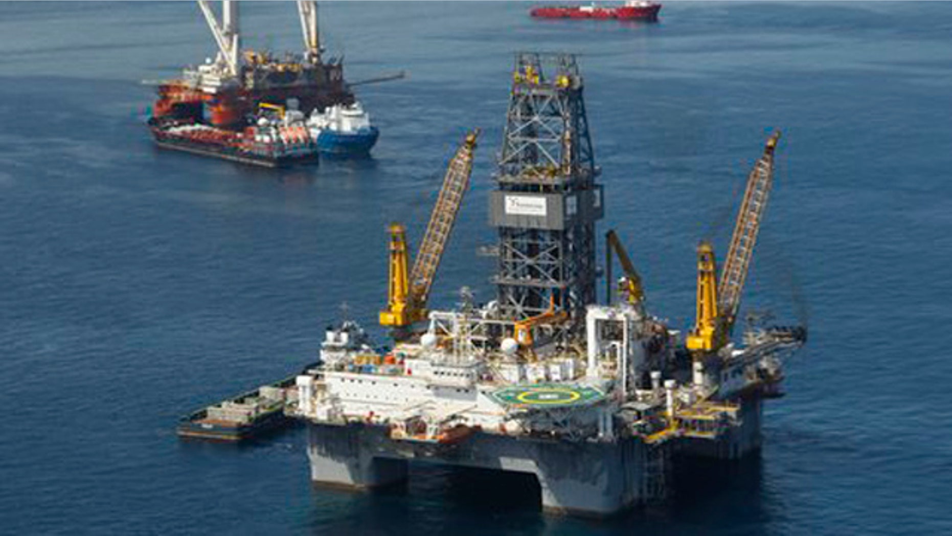 Aug. 3, 2010: Development Driller III, which is drilling the primary relief well, and the Helix Q4000, background left, the vessel being used to perform the static kill operation, at the site of the Deepwater Horizon Oil Spill in Gulf of Mexico, off the coast of Louisiana.