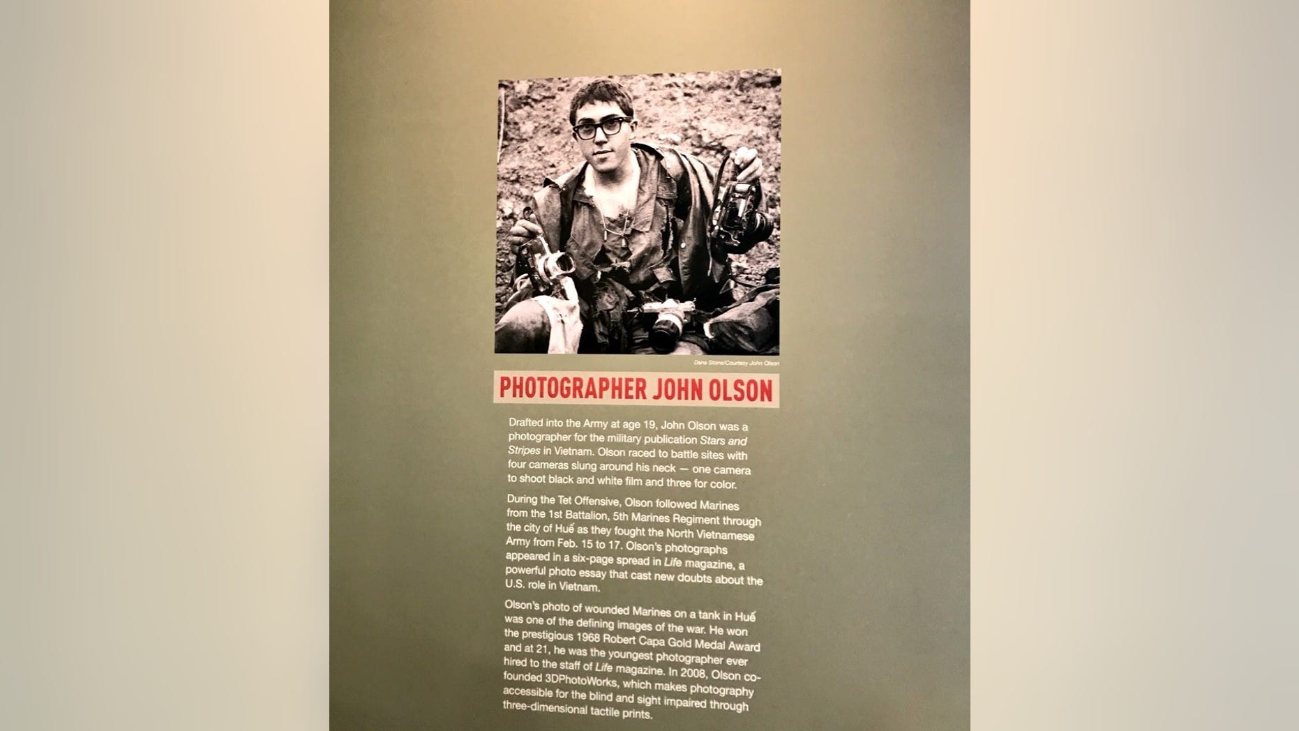 John Olson, a former war photographer, sheds a new light into a defining moment in American history with an exhibit at the Newseum in Washington, D.C.